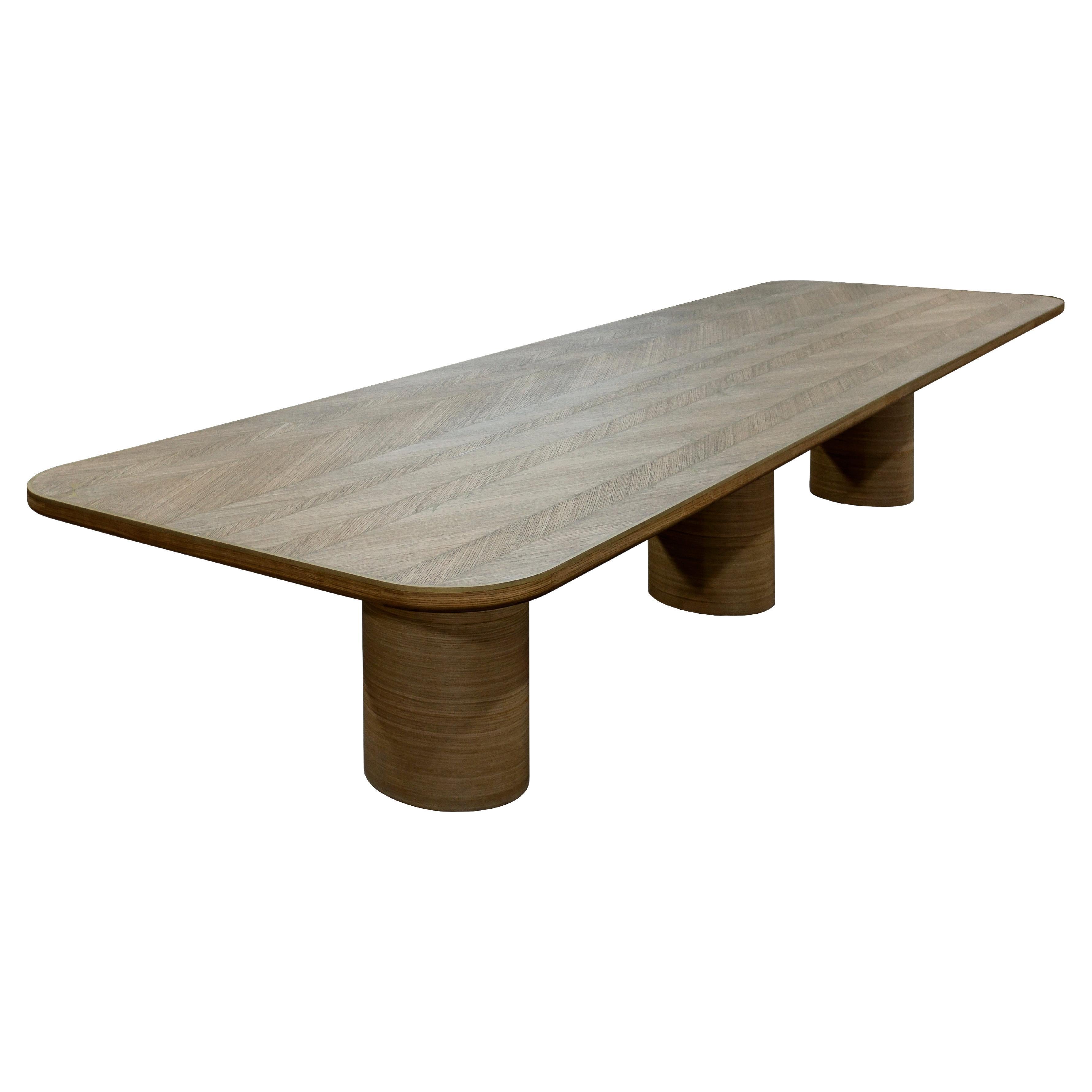 X dining table made of natural French Oak and brass inlays For Sale