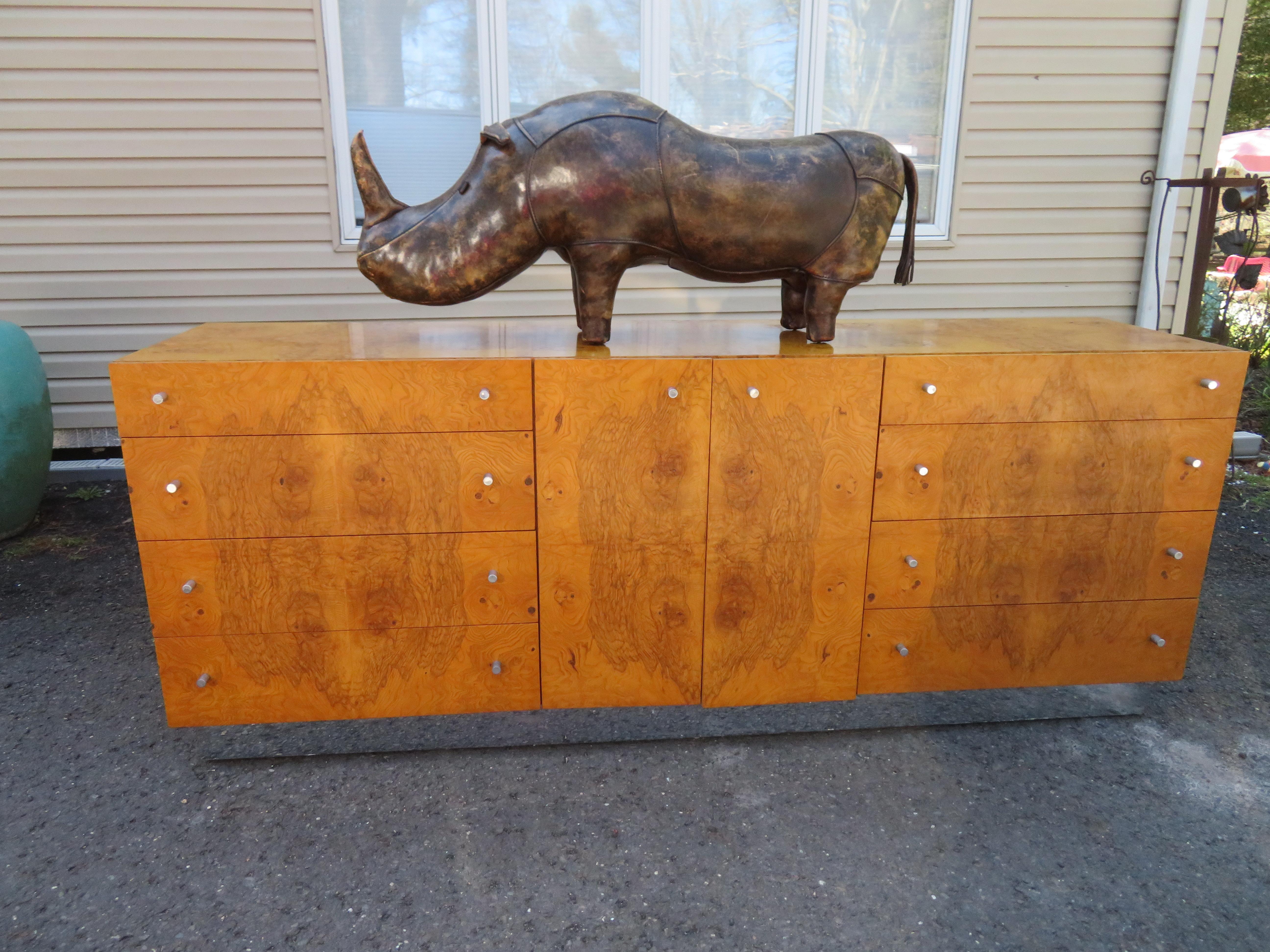 Vintage XL leather rhinoceros decorative footstool designed by Dimitri Omersa for Abercrombie and Fitch, circa 1960s is hand-stitched and features aged leather. This Charming fellow is huge-much bigger than I expected. It measures 20
