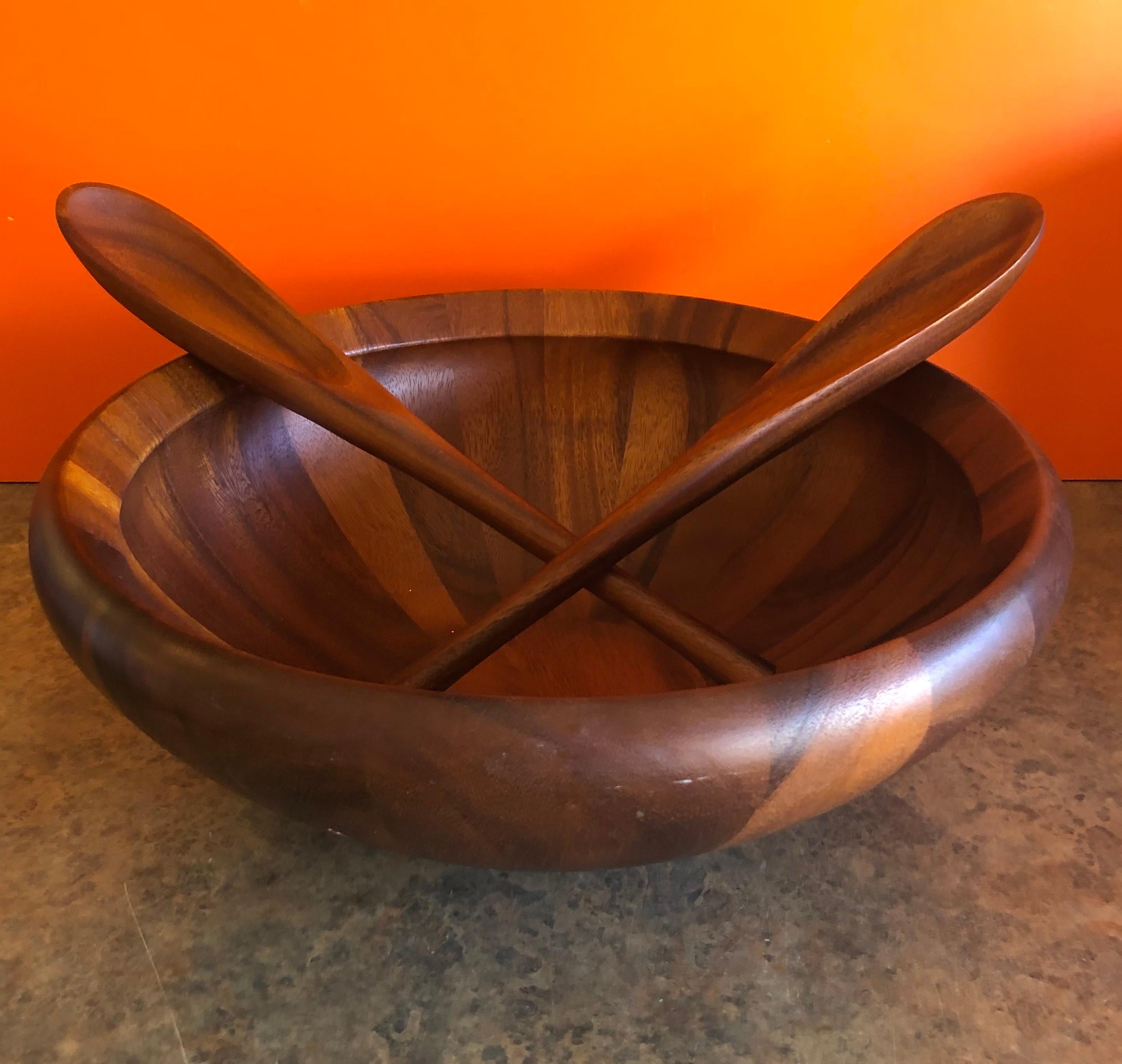 Beautiful X-large walnut salad bowl designed by Jens Quistgaard for Dansk, circa 1980s. The piece comes with its original servers (never used) and has been recently oiled. #1348.