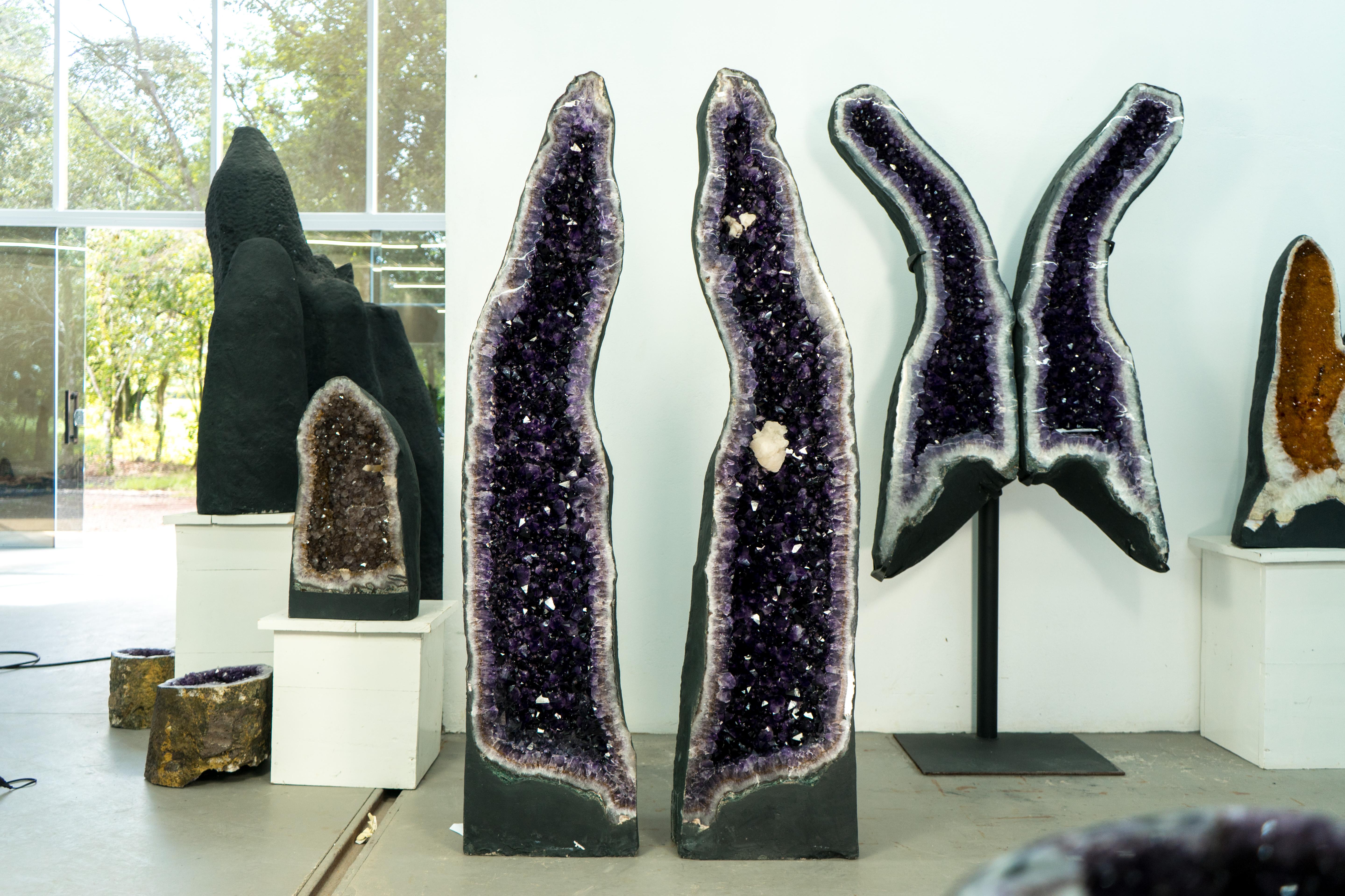 Majestic Pair of High-Grade Amethyst Geodes: 5.7 Feet Tall with Pure, Deep Purple Amethyst Druzy

▫️ Description

A breathtaking pair of Amethyst Geodes, these natural wonders stand at an impressive 5.7 feet tall (180cm) and showcase a glittering