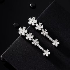 X Orecchini con diamanti lilla