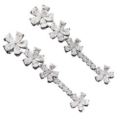 X Orecchini con diamanti lilla X Orecchini con diamanti lilla