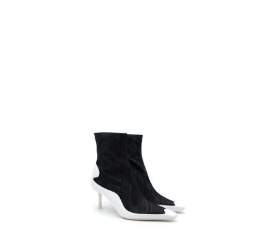 Jimmy Choo/Marine Serre Black Moire Taffeta White Leather Ankle Boots
 
 - Part of a limited-edition collaboration between renowned shoemaker Jimmy Choo, and emerging Parisian designer Marine Serre
 - Fusion of classical style, with futuristic