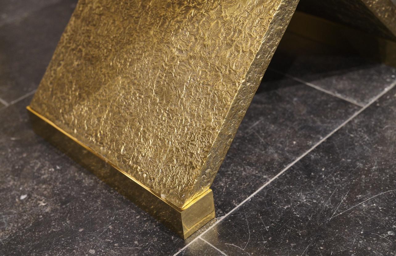 Pair of X side  table, hammered details X brass base with rock crystal top. Created by Phoenix Gallery.
