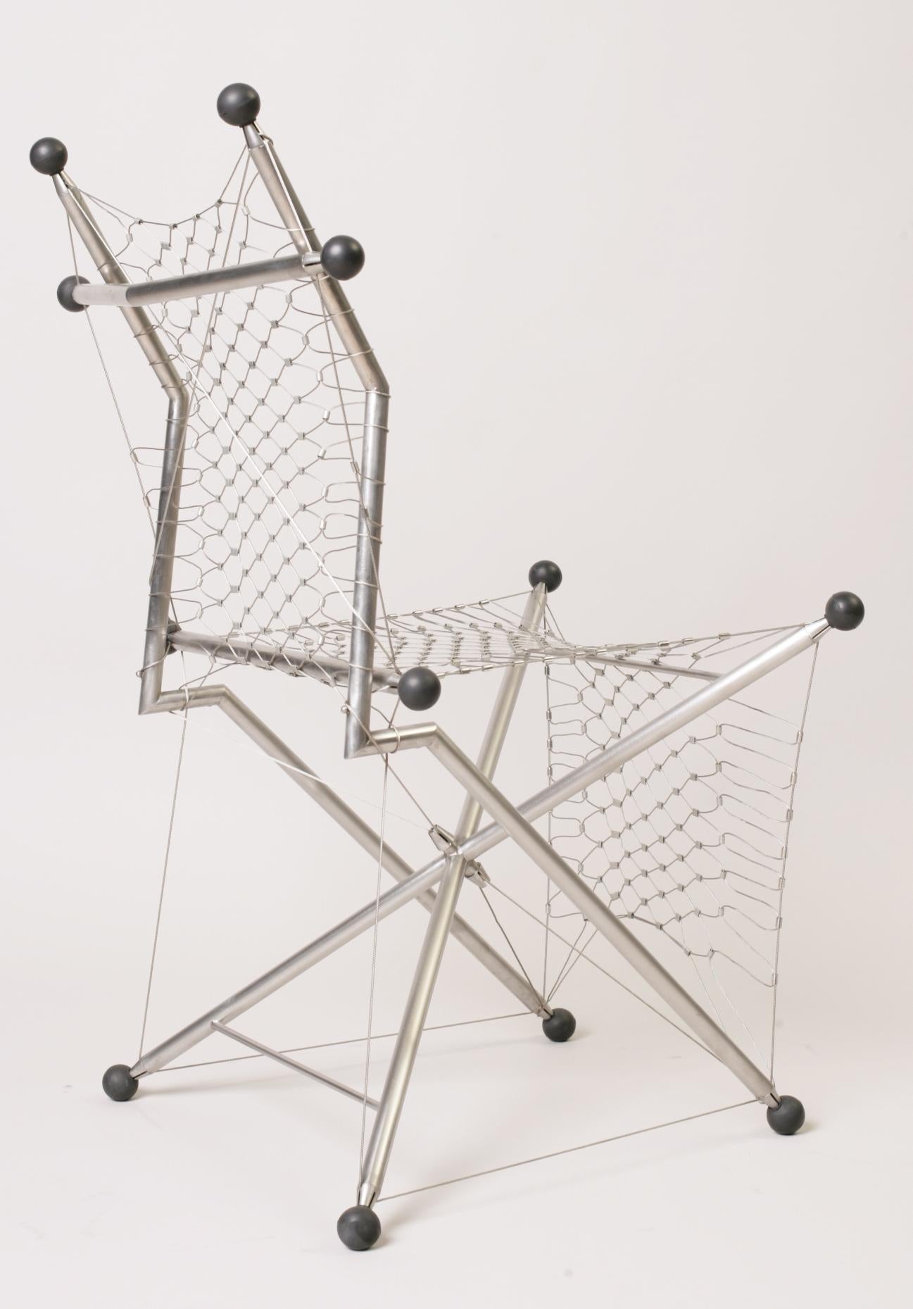 Chaise X de Konstantin Achkov Studio
Edition limitée à 1 pièce
Dimensions : D 55 x L 55 x H 99 cm. SH : 45 cm.
MATERIAL : Résine et acier inoxydable.

La chaise X-tense est une véritable structure de tenségrité qui consiste en un X--
et quatre