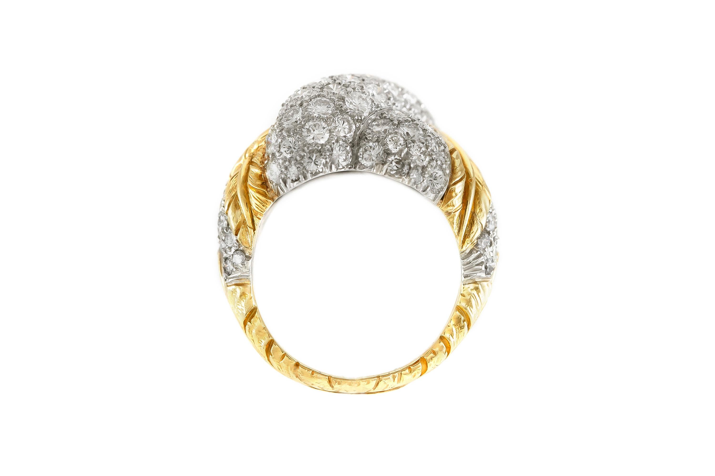 The ring if finely crafted in 14k yellow gold with diamonds weighin approximately total 4.50 carat.
Circa 1980