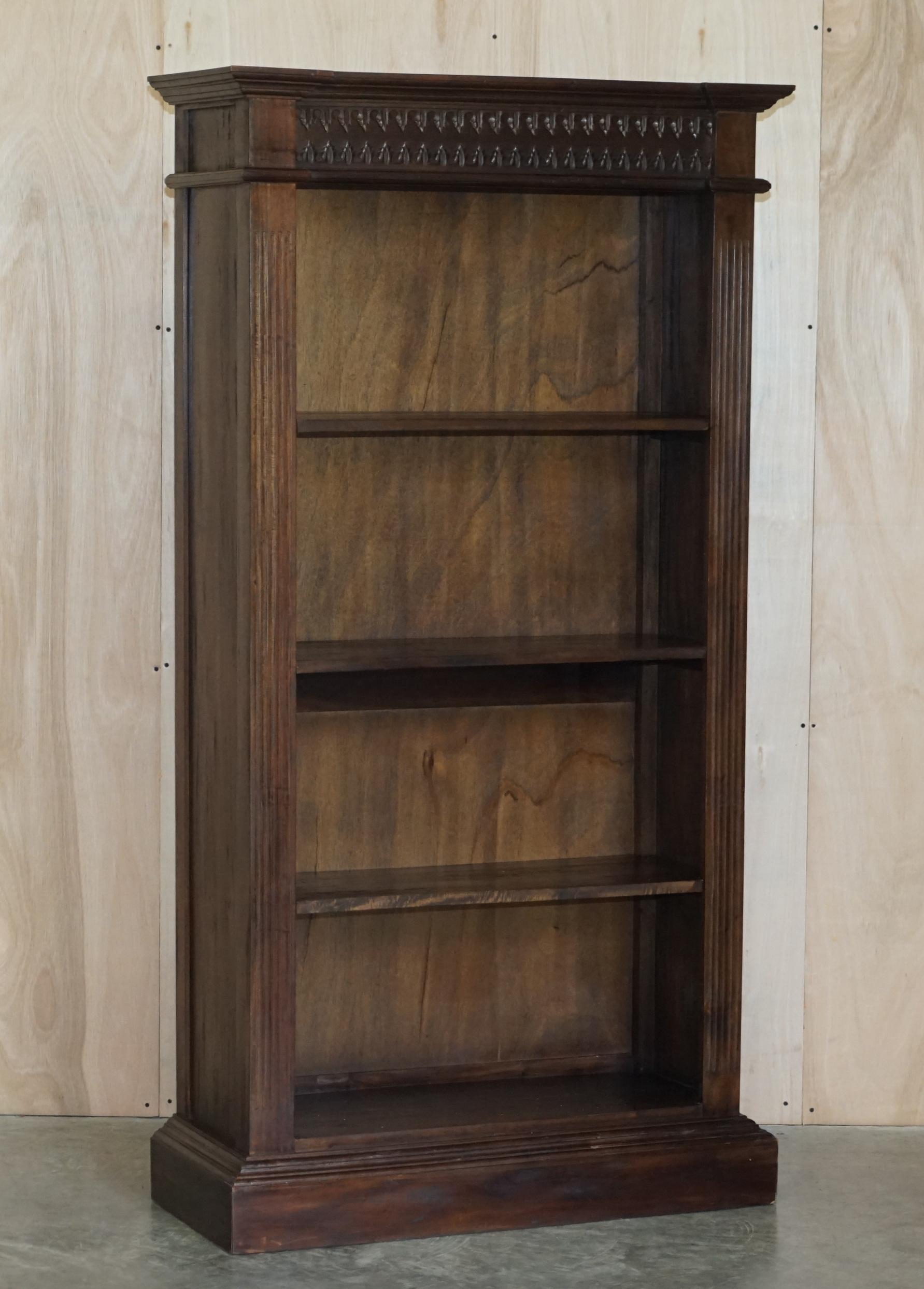 We are delighted to offer this set of three vintage hand carved solid mahogany, Jacobean revival style open library bookcases

A very good looking and well made suite, they have ornate carvings to the top which are very Jacobean revival, the bases