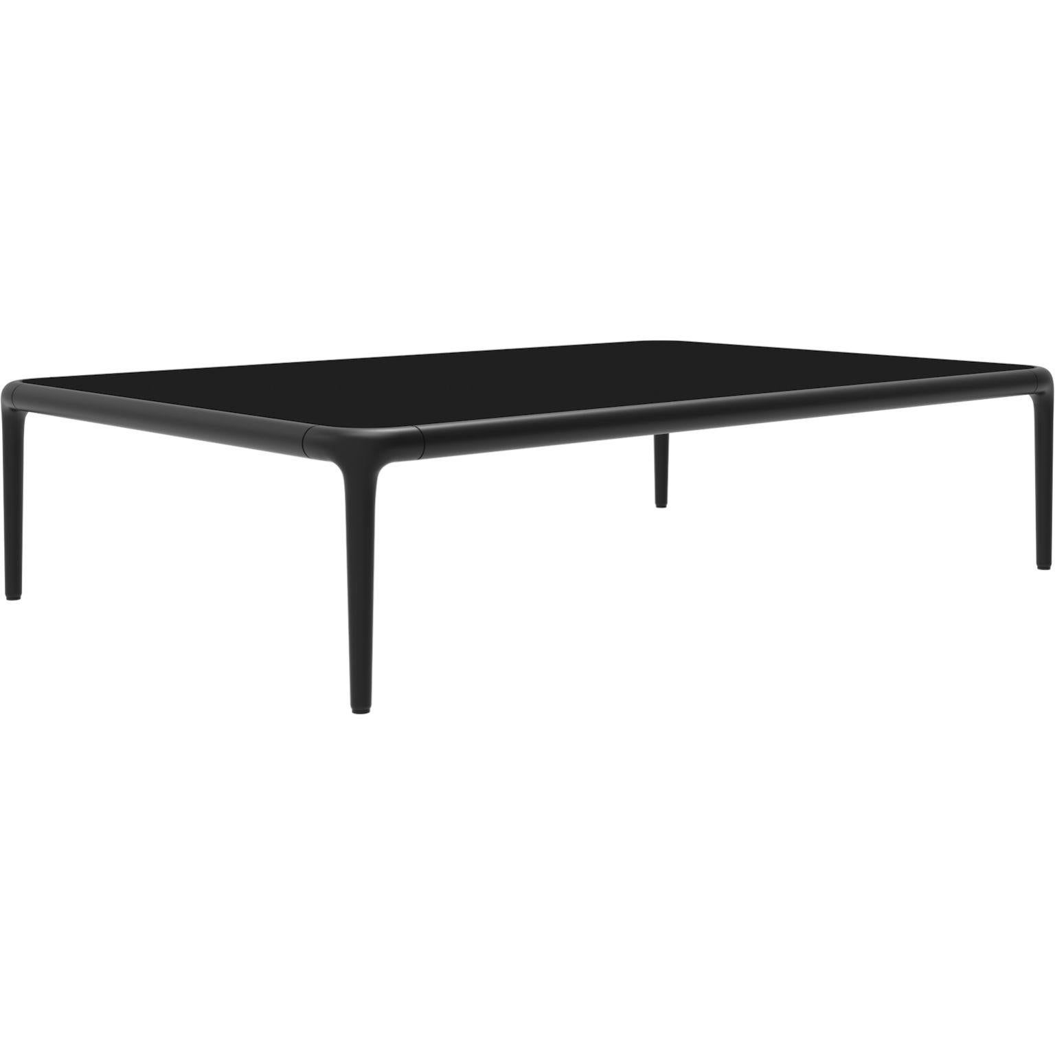 Xaloc black coffee table 120 with glass top by Mowee.
Dimensions: D120 x W80 x H28 cm.
Materials: Aluminum, tinted tempered glass top.
Also available in different aluminum colors and finishes (HPL Black Edge or Neolith). Please contact