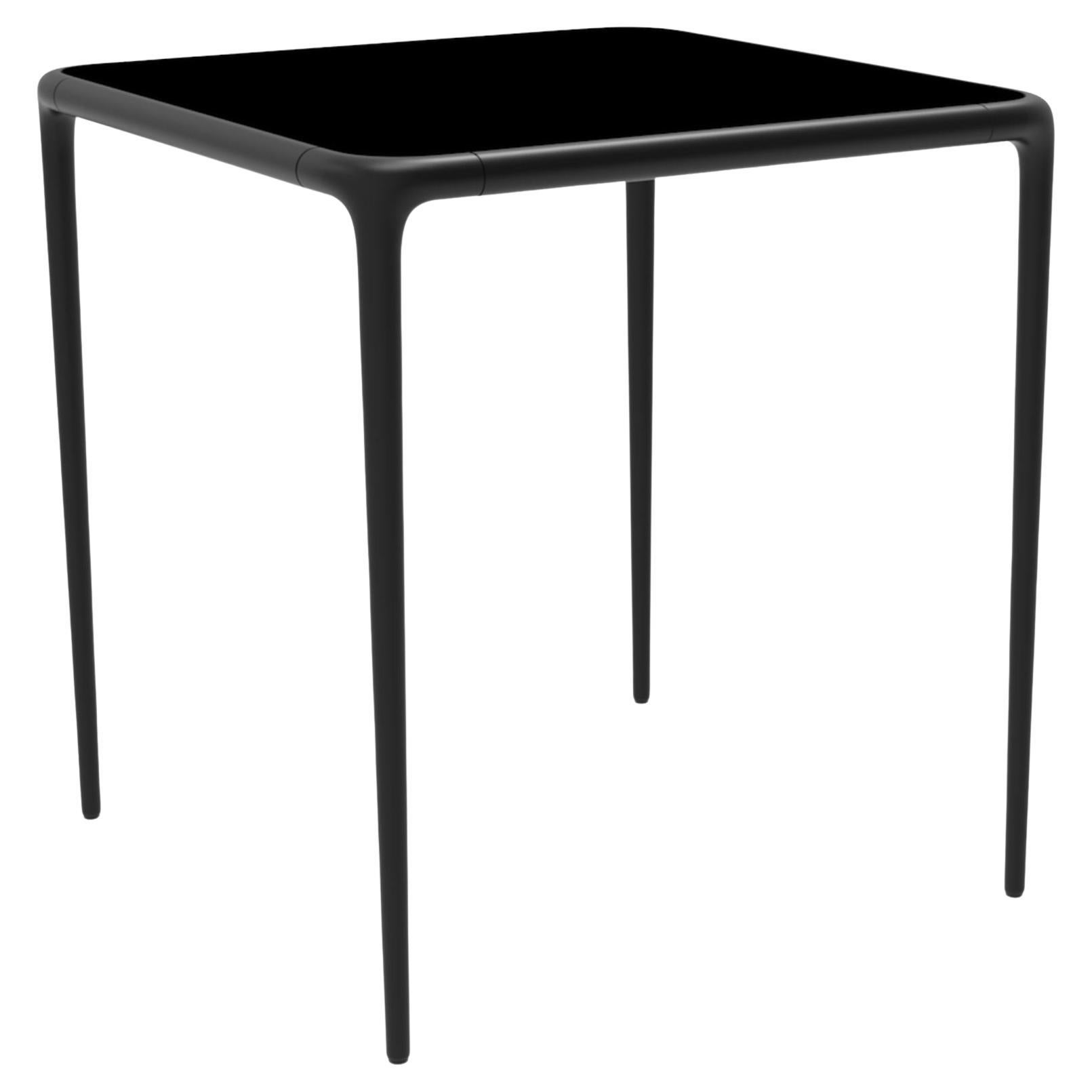 Xaloc Black Glass Top Table 70 by Mowee For Sale