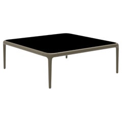 Xaloc Bronze-Couchtisch 80 mit Glasplatte von Mowee