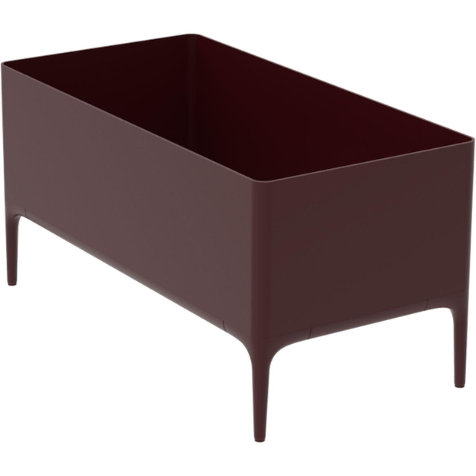 Xaloc Burgundy Planter by MOWEE
Dimensions: D90 x W45 x H45 cm
Material: Aluminium
Weight: 11 kg
Also Available in different colours and finishes. 

 Xaloc synthesizes the lines of interior furniture to extrapolate to the exterior, creating an
