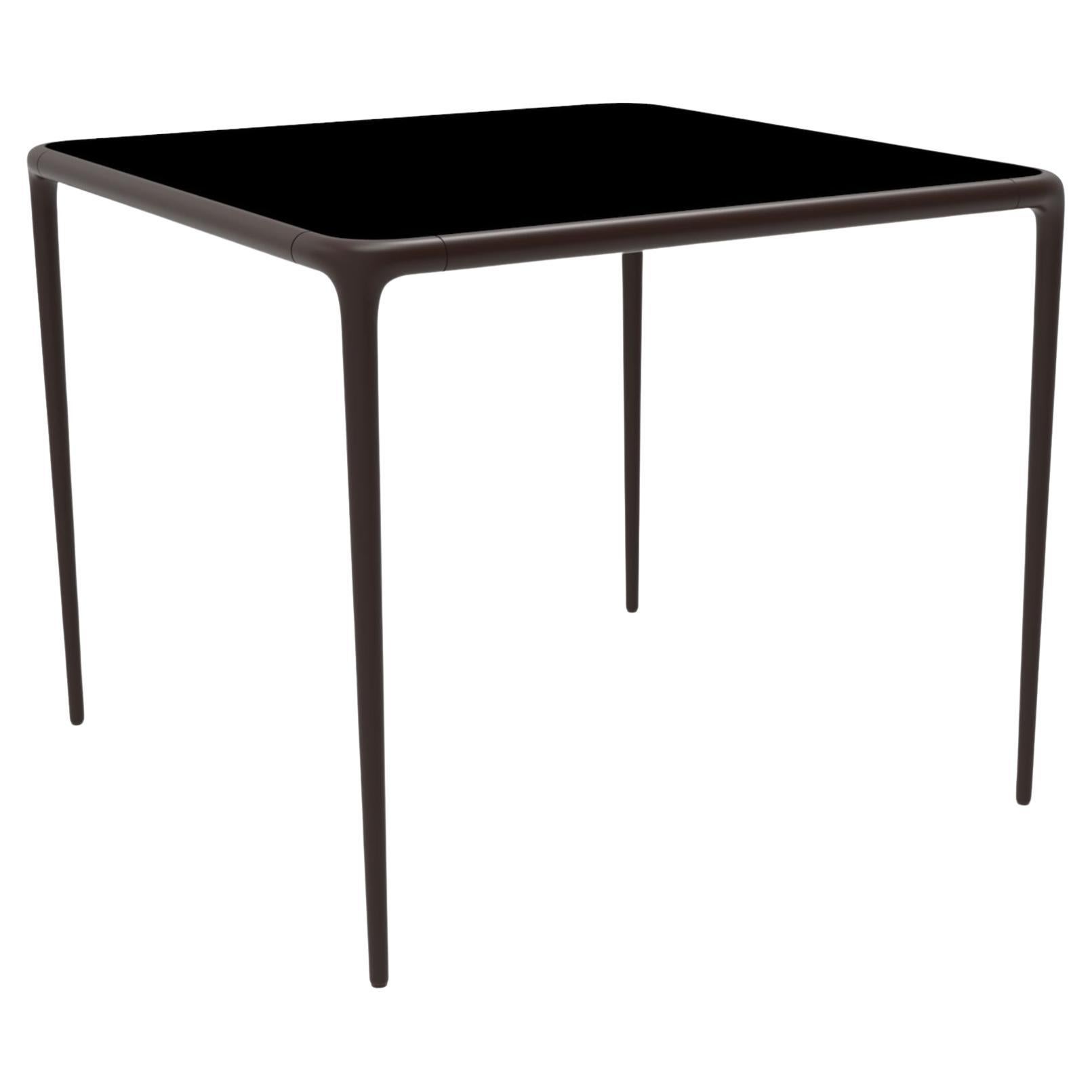 Xaloc Chocolate Glass Top Table 90 by Mowee For Sale