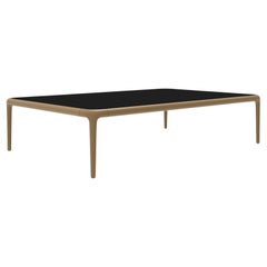 Table basse Xaloc dorée 120 avec plateau en verre par Mowee