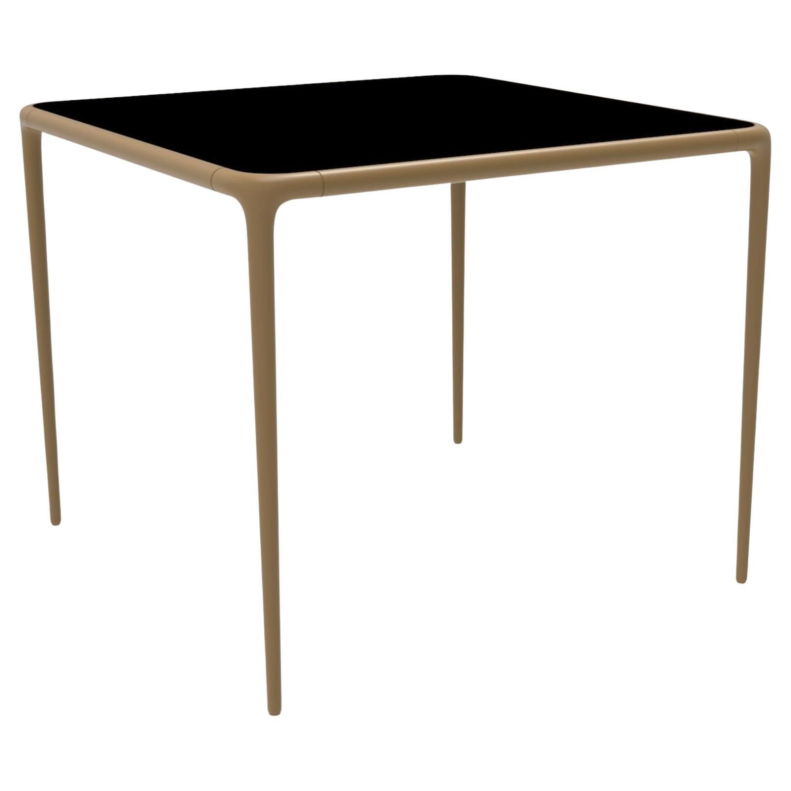 Xaloc Gold Glass Top Table 90 by Mowee