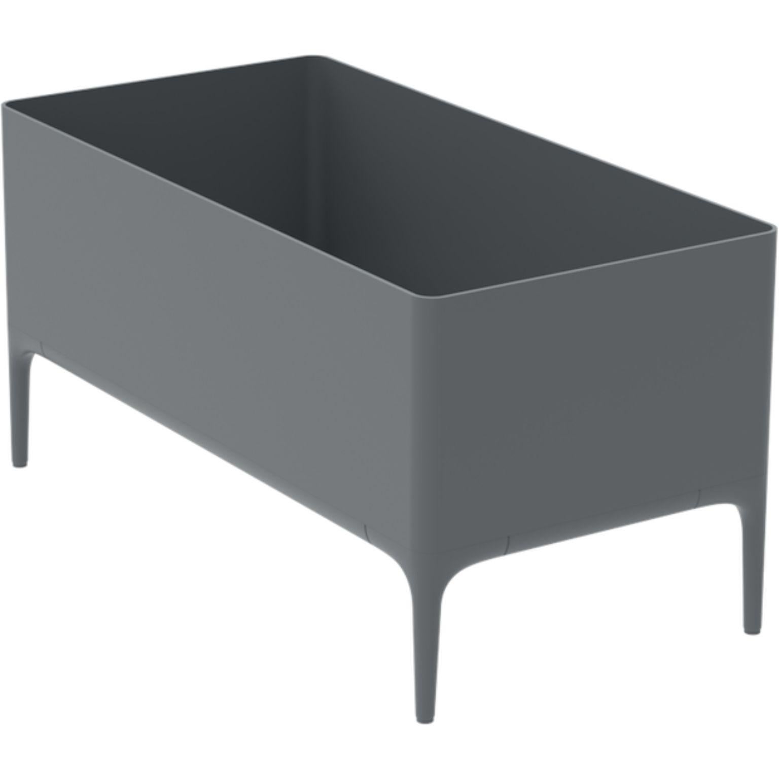 Xaloc Grey Planter by MOWEE
Dimensions: D90 x W45 x H45 cm
Material: Aluminium
Weight: 11 kg
Also Available in different colours and finishes. 

 Xaloc synthesizes the lines of interior furniture to extrapolate to the exterior, creating an