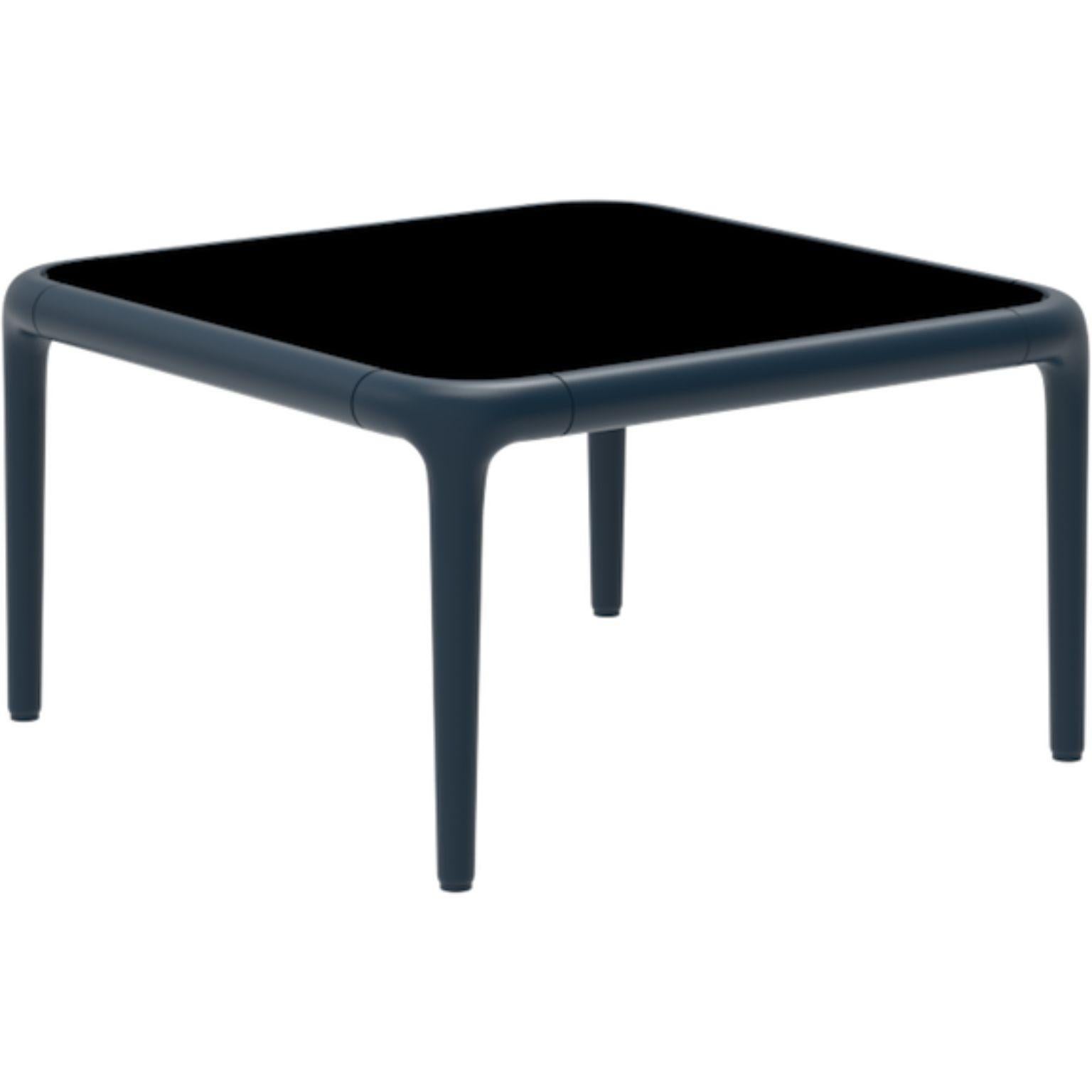 Table basse 50 en verre Xaloc navy par MOWEE
Dimensions : D50 x L50 x H28 cm
Matériaux : Aluminium, plateau en verre trempé teinté.
Également disponible dans différentes couleurs et finitions d'aluminium (HPL Black Edge ou Neolith).

Xaloc