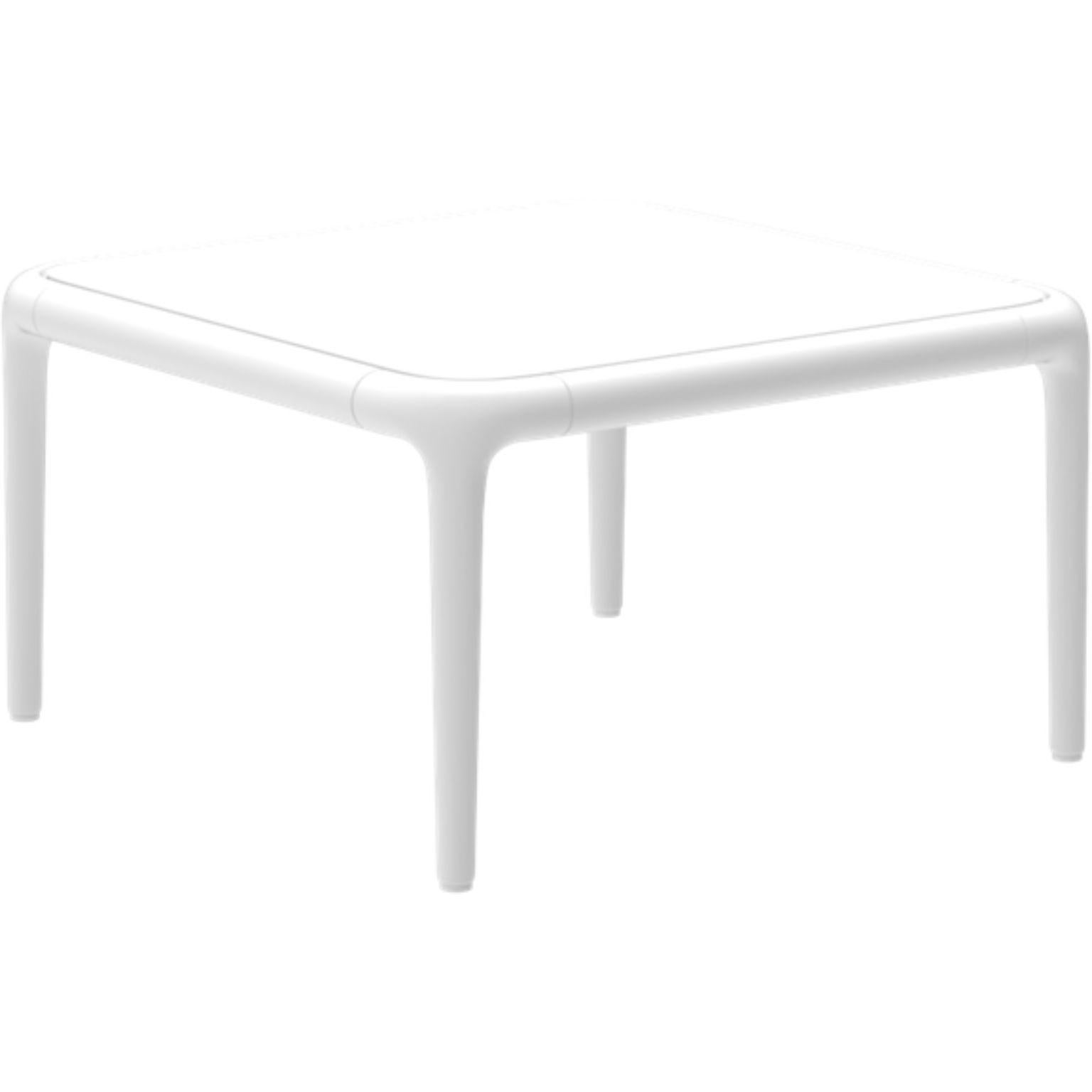 Xaloc white coffee table 50 with glass top by MOWEE
Dimensions: D50 x W50 x H28 cm
Materials: Aluminum, tinted tempered glass top.
Also available in different aluminum colors and finishes (HPL Black Edge or Neolith). 

Xaloc synthesizes the