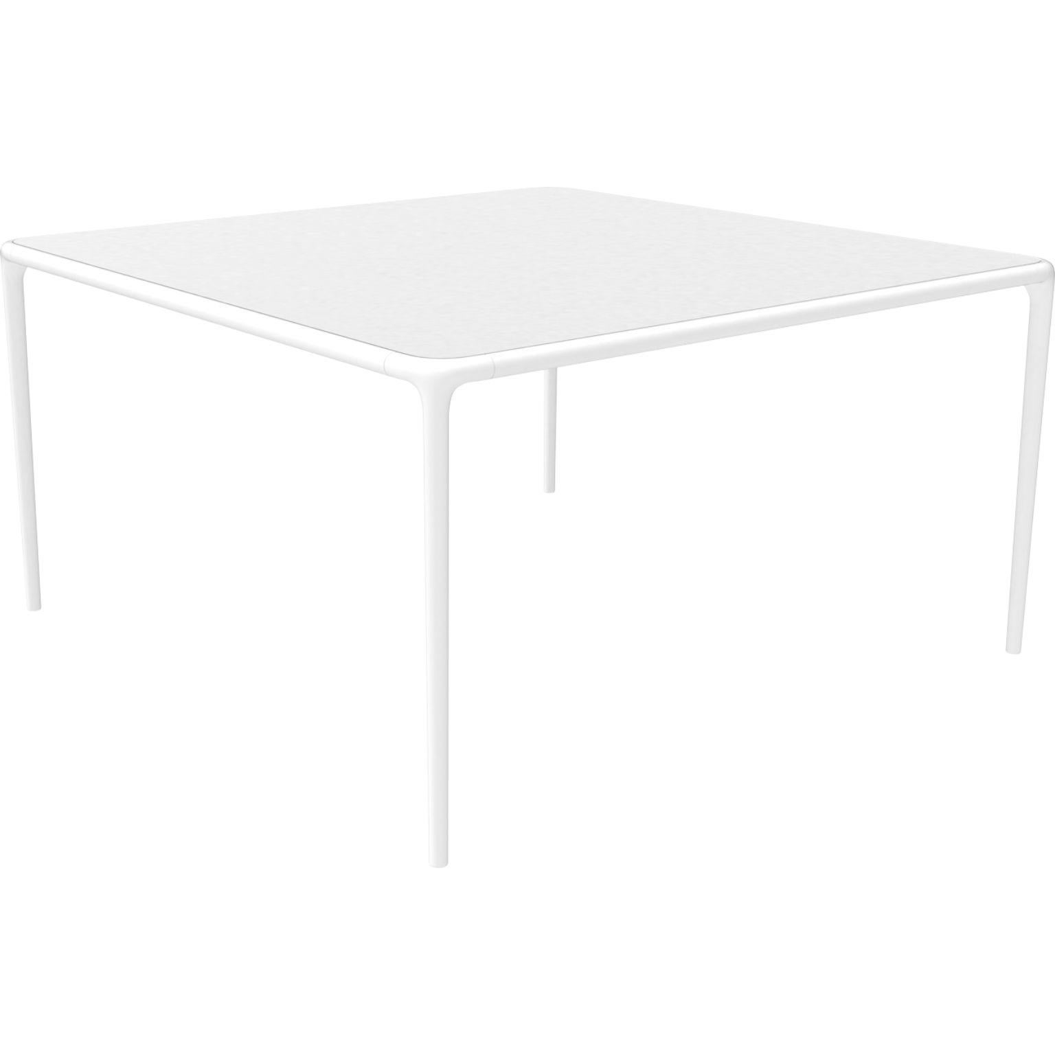 Xaloc white glass top table 140 by MOWEE
Dimensions: D140 x W140 x H74 cm
Material: Aluminum, tinted tempered glass top.
Also available in different aluminum colors and finishes (HPL Black Edge or Neolith). 

Xaloc synthesizes the lines of