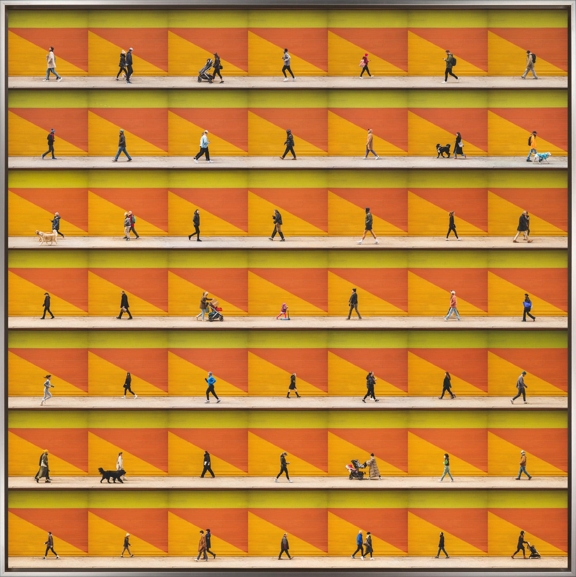 "Hudson Square, NYC" is a framed photograph on aluminum by Xan Padron, depicting a compilation of walking figures set against a vibrant patterned background. Padron's signature technique of splicing together individual photographs to craft a larger