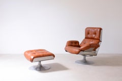 Xavier Feal  rare swivel chair with footrest in curved steel