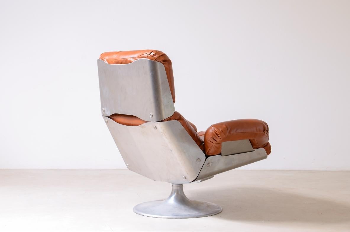 Xavier Feal  rare swivel chair with footrest in curved steel For Sale 2