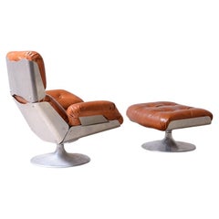 Xavier Feal  rare swivel chair with footrest in curved steel
