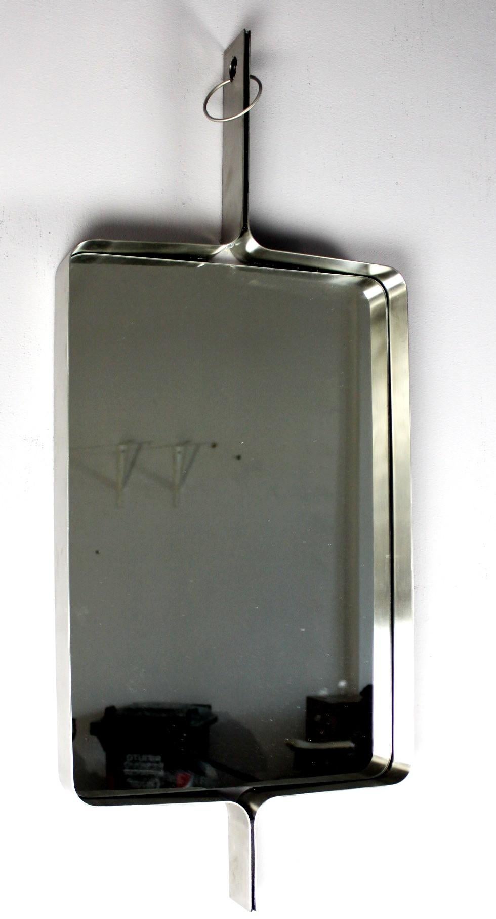 A Xavier-Feal French rectangular brushed stainless steel wall mirror, circa 1970.
Produced by Inox Industrie, circa 1970.
This mirror was previously attributed to Michel Boyer.
Excellent condition with no scratches or dents.
The mirror glass portion