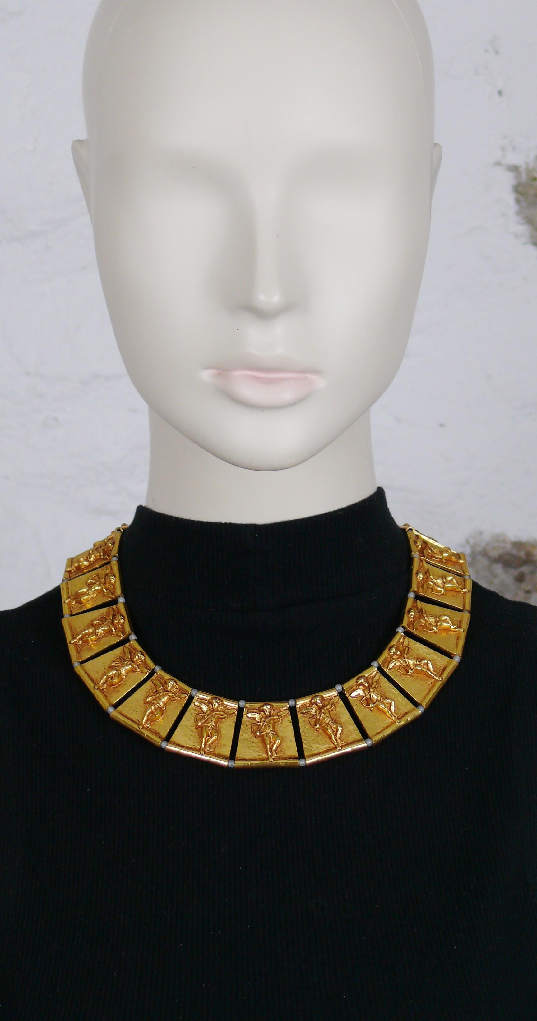 XAVIER LOUBENS vintage antiqued gold toned collar necklace featuring gorgeous links embossed with 3-dimensional cupids, alterning with milky color beads (originally nacre faux pearls).

Lovely clasp embellished with a square clear crystal.
Push