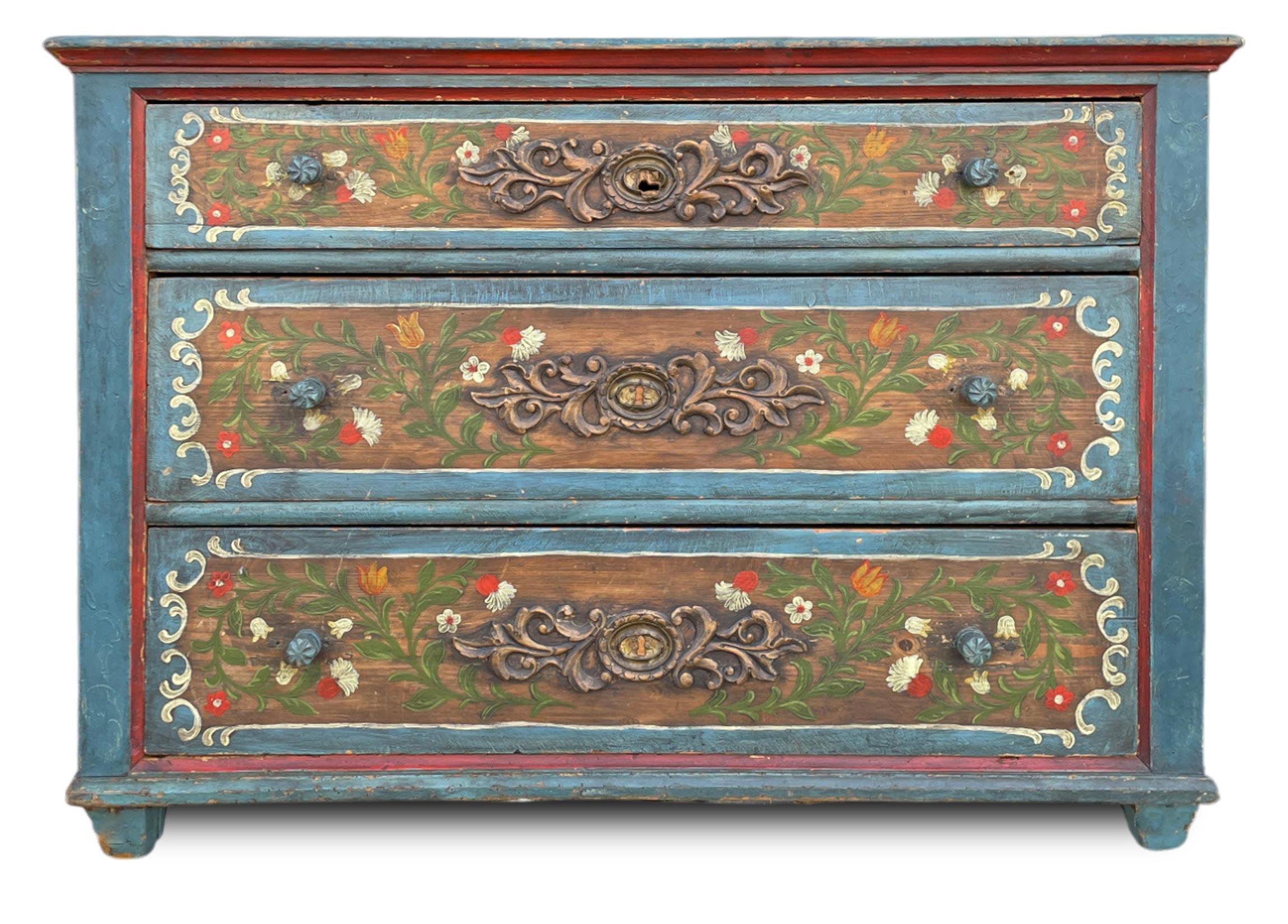 Alpine Painted Chest of Drawers

Measurements: H. 79 cm – W. 112 cm – D. 55 cm
Period: circa 1850
Origin: Austria
Wood: Fir

Description:
A blue painted chest of drawers, with three tie rods.
On the fronts of the drawers there are floral decorations