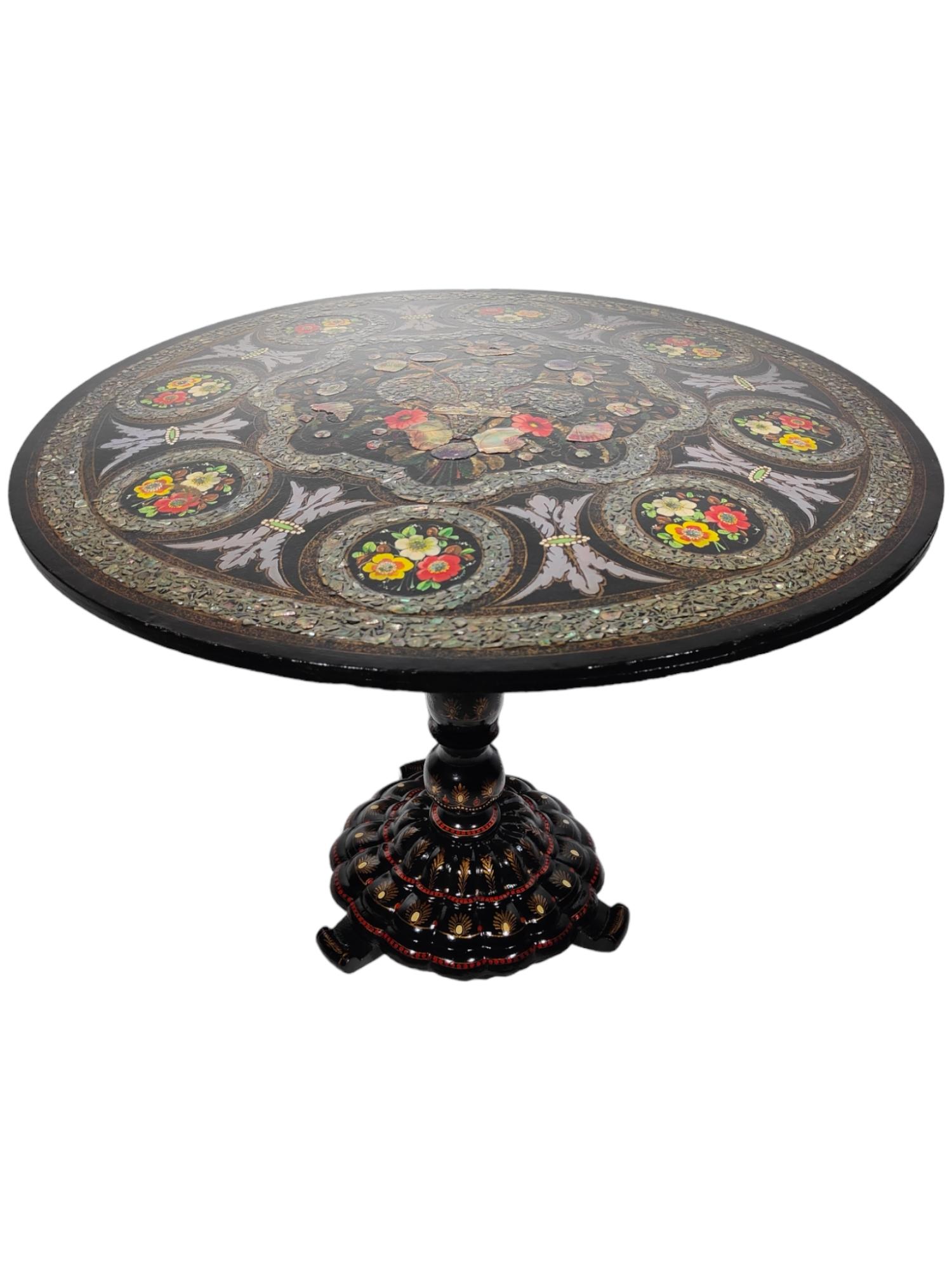 19th century French table with mother of pearl.
French table from the 19th century with mother-of-pearl very decorative table from the 19th century with mother-of-pearl inlays and hand-painted. Measures 91 cm in diameter and 73 cm in height