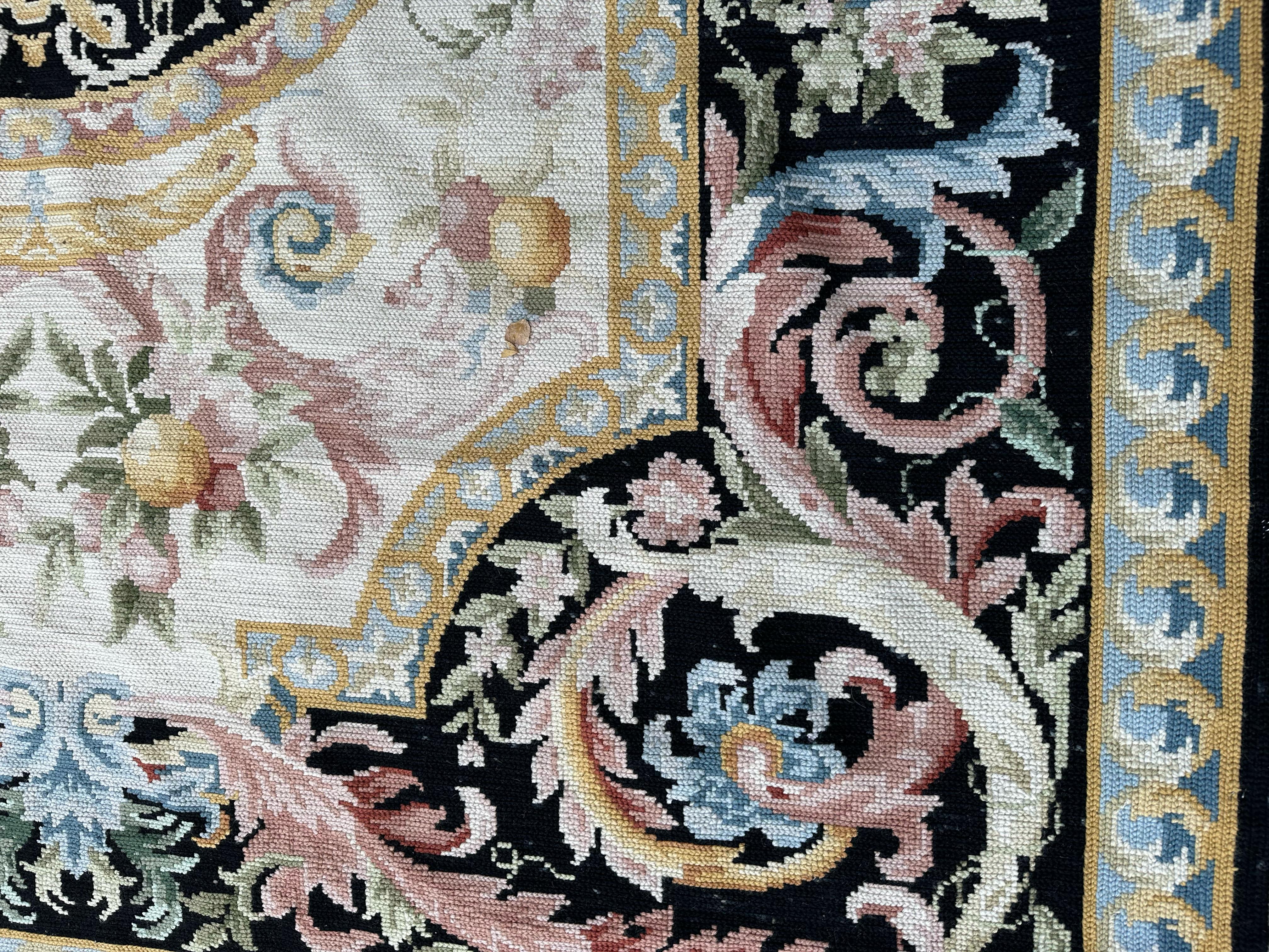 
The Arraiolos Tapestry, also known as Arraiolos Embroidery, is a traditional Portuguese needlework technique that originated in the town of Arraiolos, located in the Alentejo region of Portugal. It is characterized by intricate woolen stitches