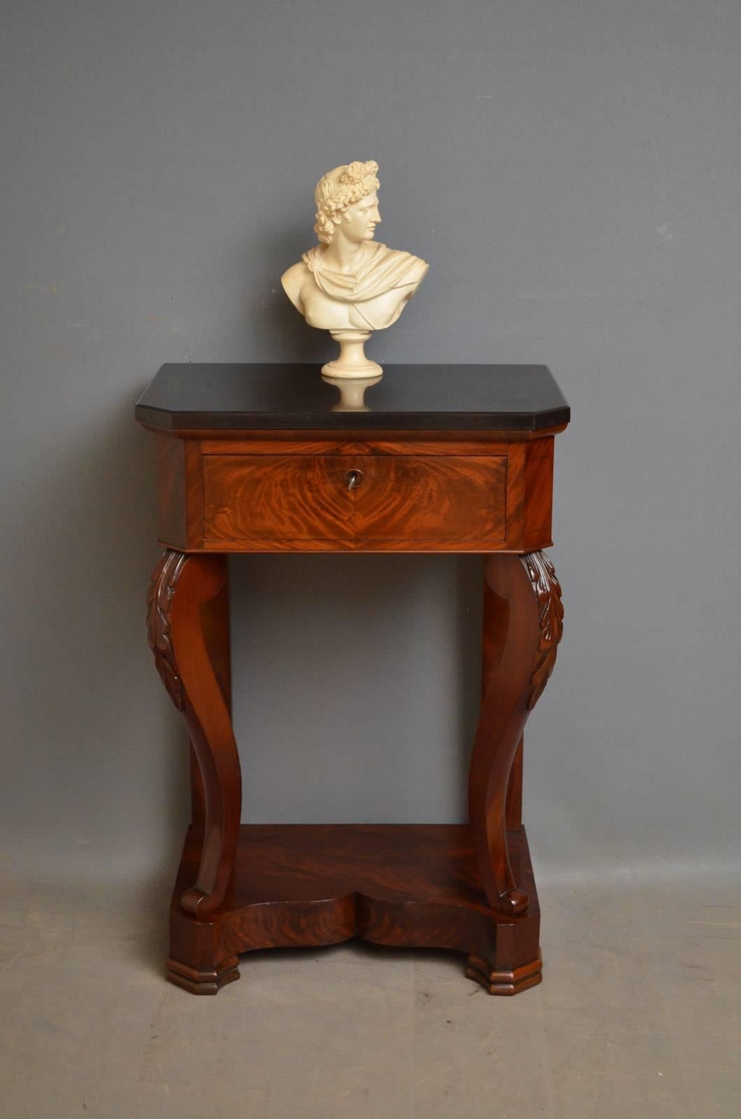 Sn4295, 19th century mahogany hall table of unusually narrow proportions, having original black marble and flamed mahogany, oak lined frieze drawers fitted with original working lock and a key, all standing on carved cabriole legs terminating in