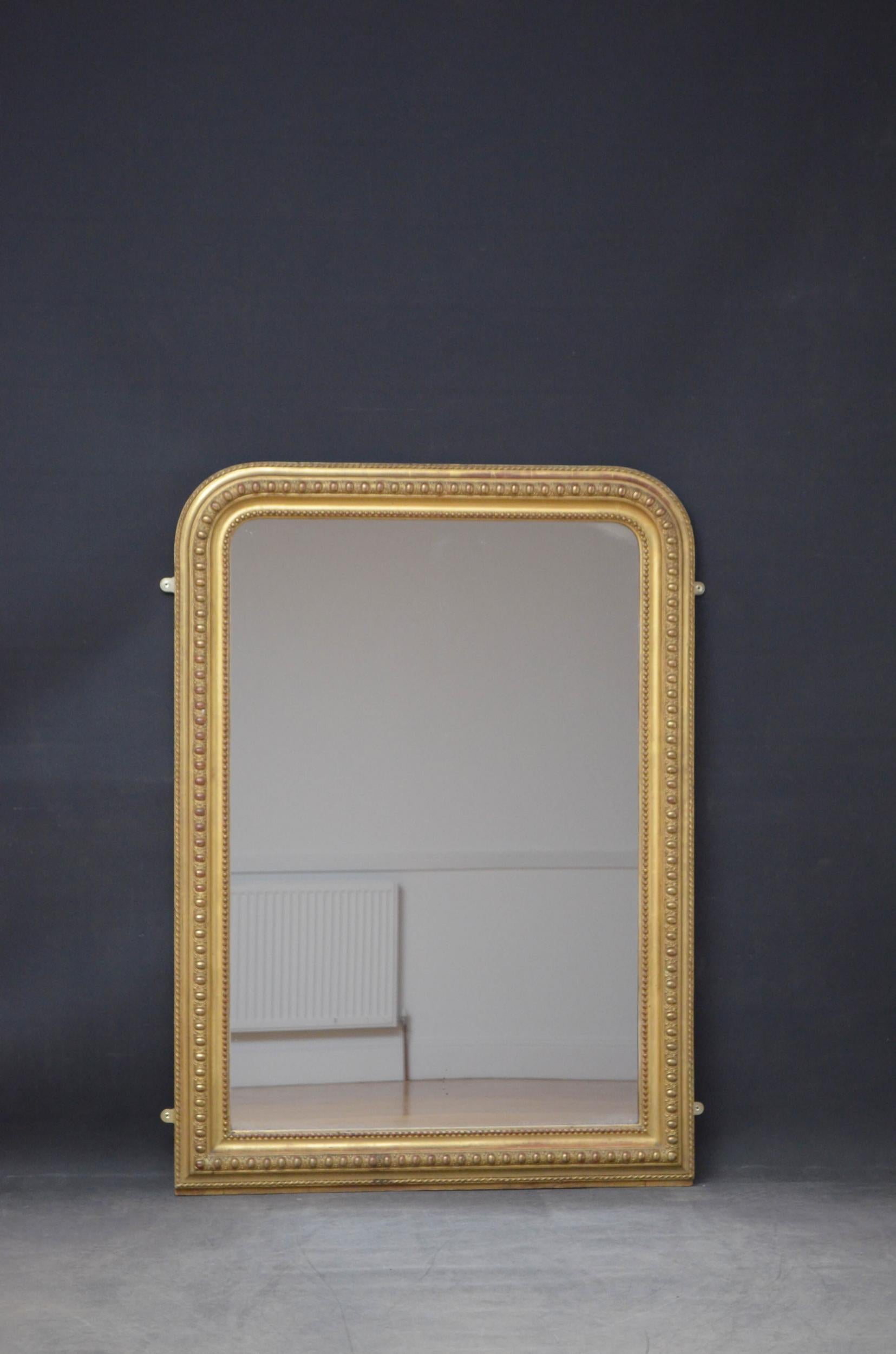 Sn4872 a 19th century giltwood mirror, having original glass with some imperfections in beaded and gadrooned and carved gilded frame. This antique mirror retains its original glass, gilt and backboards all in fantastic home ready condition, circa