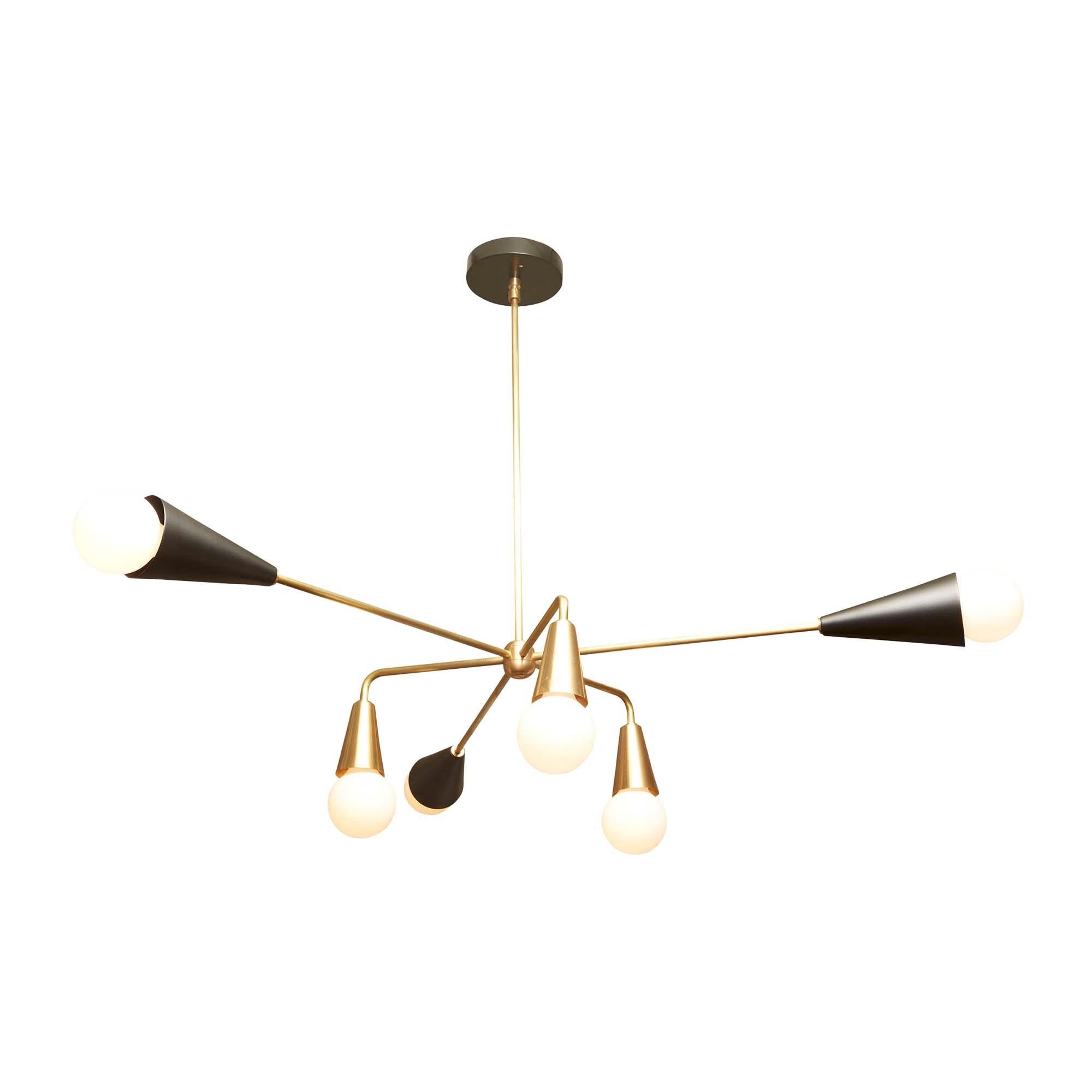 The XL 6-globe chandelier features six arms that are centered on a brass rod. Three of the globes are angled down with brass shades. The other three have powdercoated shades.

The Lawson-Fenning collection is designed and handmade in Los Angeles,