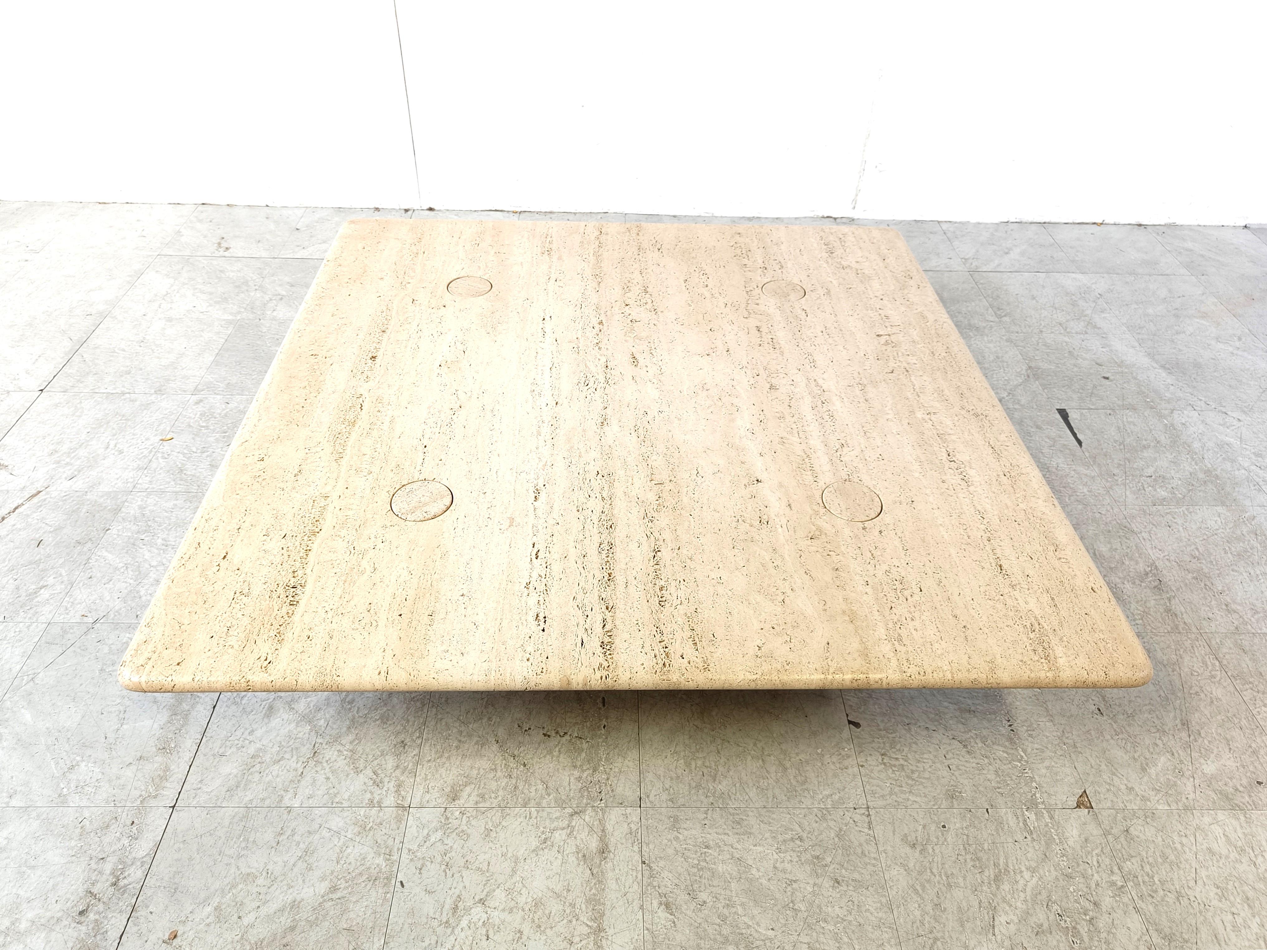 Timeless travertine coffee table with interlocking legs designed by Angelo Mangiarotti for Up&Up.

Beautiful travertine stone top.

Xl model

Good condition

1970s - Italy

Height: 28cm
Width x depth: 120cm

Ref.: 347979