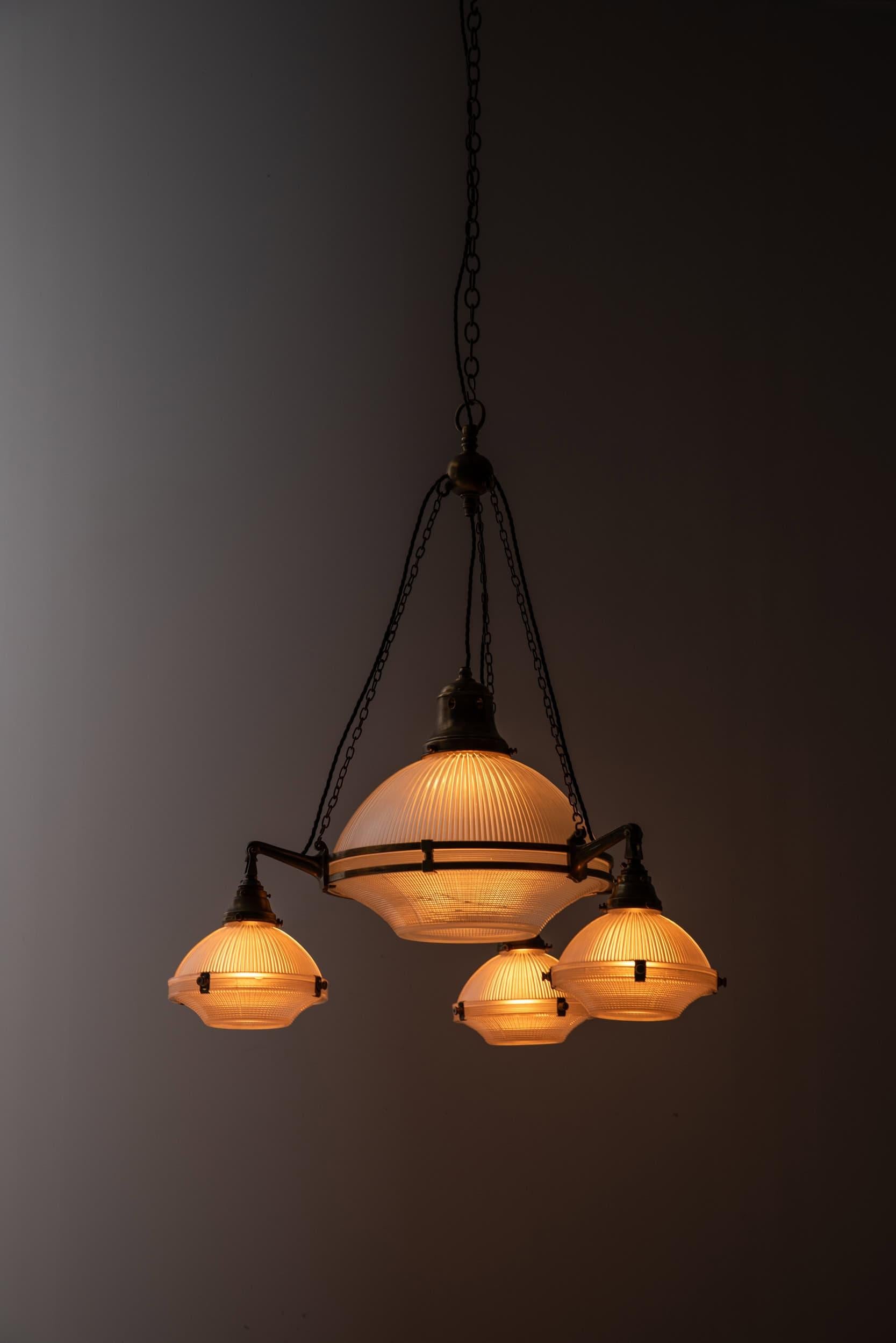 

A rare and exceptional 'Reflector-Refractor' chandelier made in England by the renowned lighting manufacturer Holophane, c.1920.

Featuring a large 14