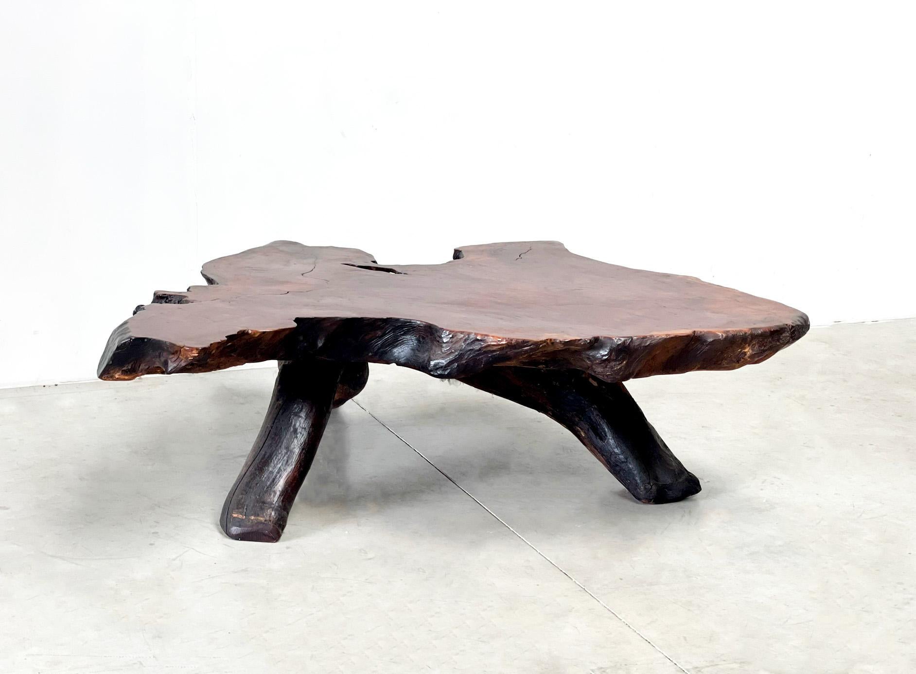 Design in its purest form. A very heavy oak coffee table made in the 80s. The wood has acquired a very nice patina over the years. The table is a very large and heavy piece. It is made out of sequoia tree! The largerst on this planet! 

