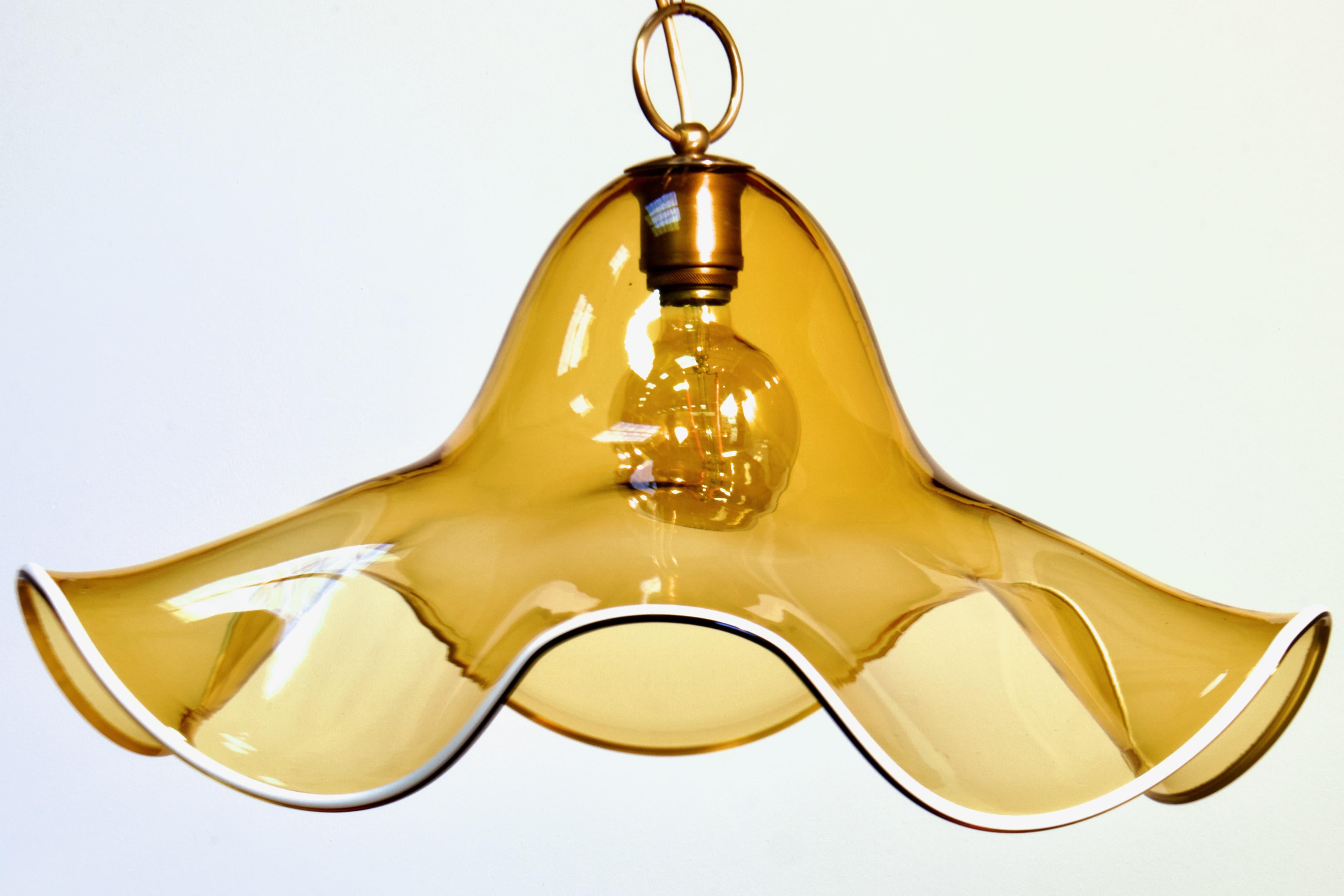 Large (24.5 inch diameter) 1970s Italian Mid-Century Organic Modern floral pendant light by La Murrina from Murano. 

Formed from one large thick sheet of hand made blow transparent glass, with a gorgeous amber tint. The sheet of glass swoops and