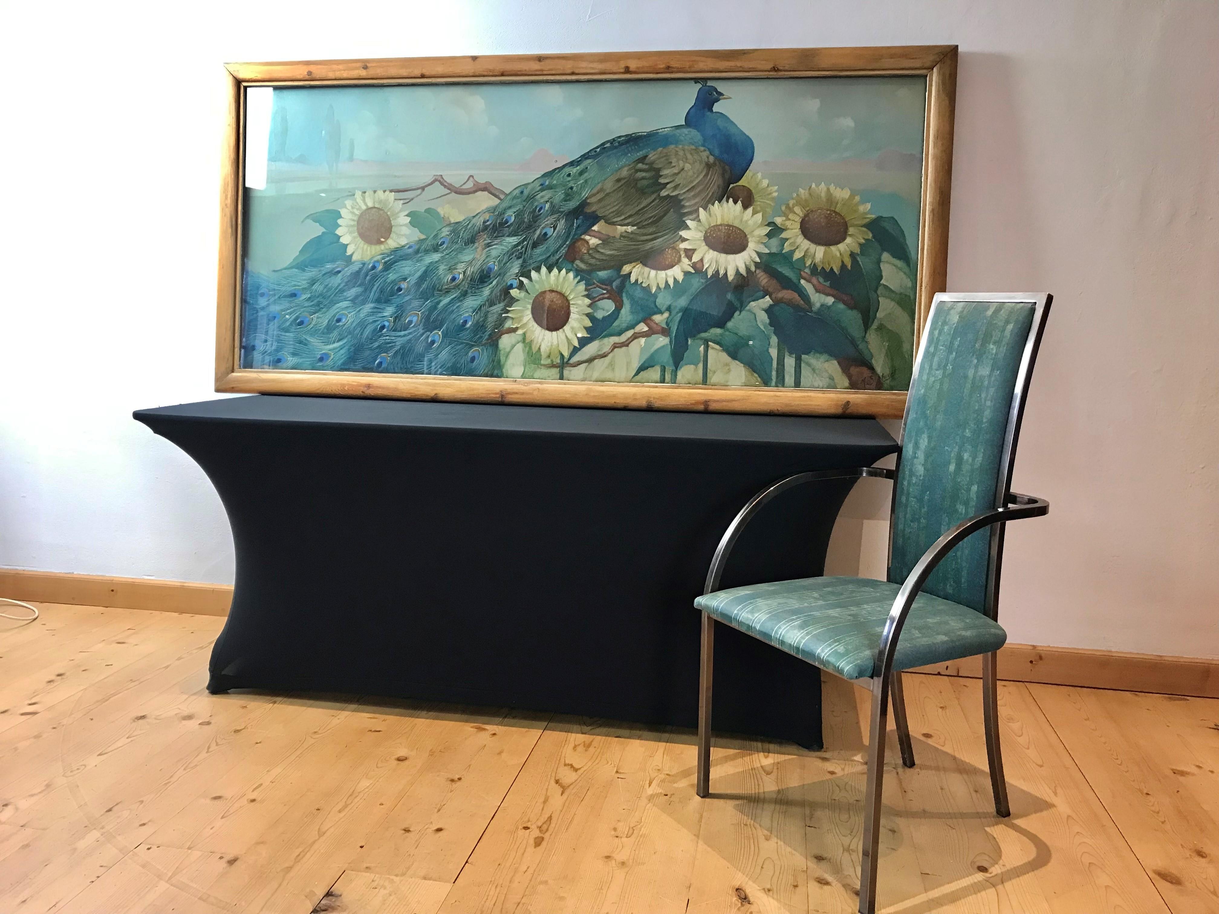 Impressive large framed painting with peacock and sunflowers. 
This awesome large artwork is signed by the artist: M. Soetaert. 
A painting in beautiful colors and framed in a thick wooden frame with glass. 
Beautiful condition with normal traces on