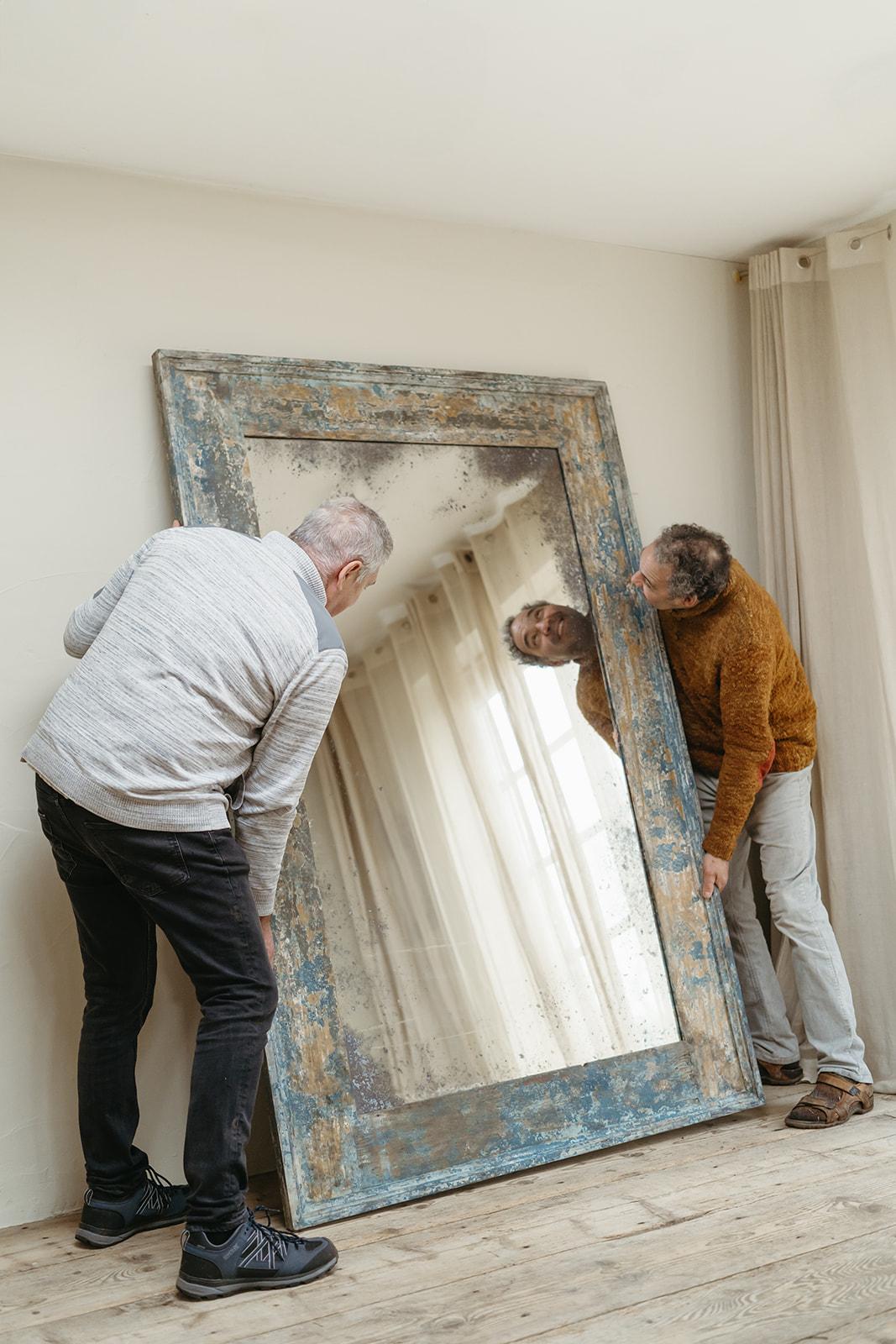an xl full lenght mirror, pineframed, with rests of old paint ... 
can be used vertical or horizontal ... 