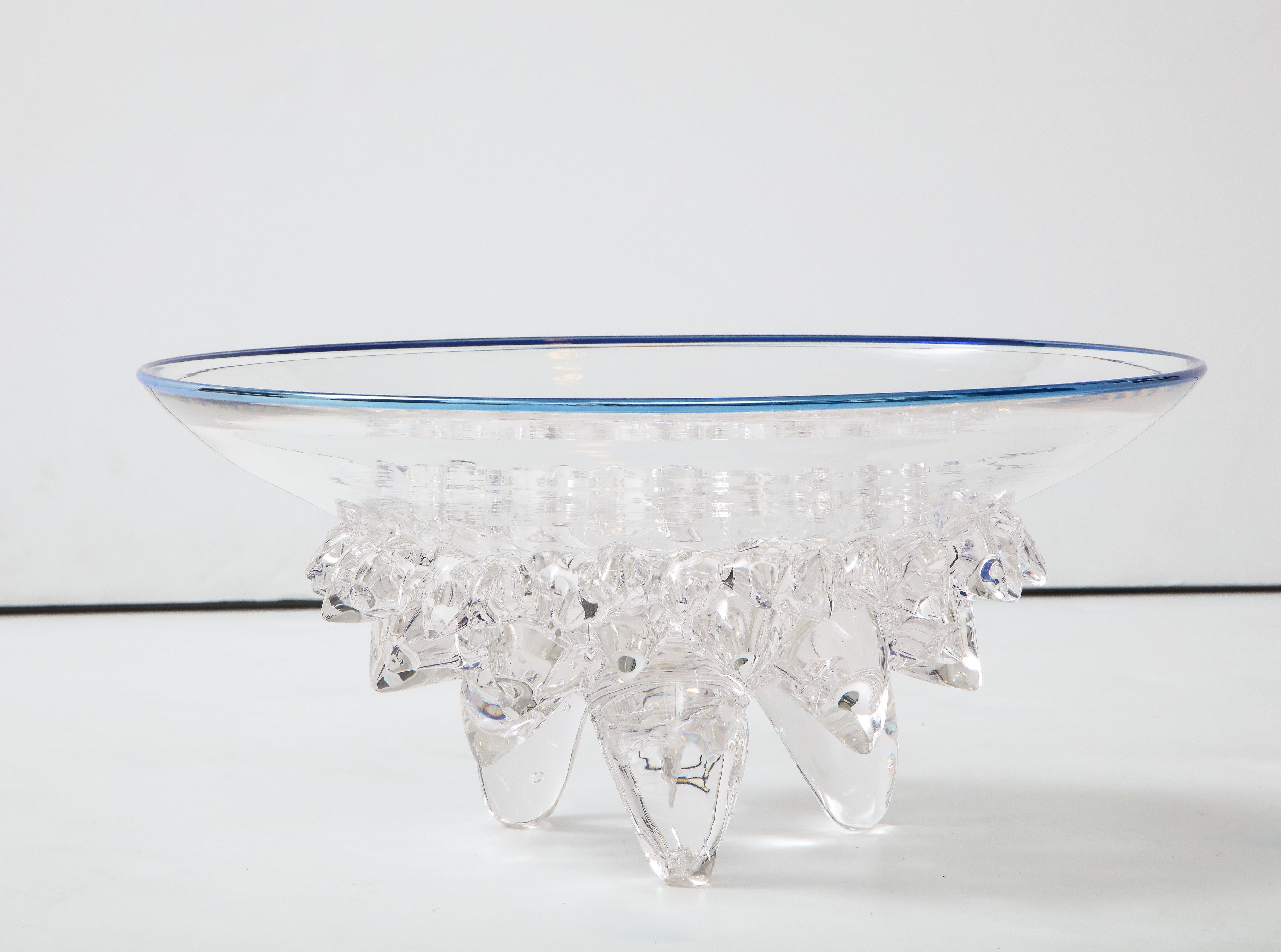 Mesmerizing handmade art glass centerpiece vessel with abstract thorn supports 
and platinum edge.
