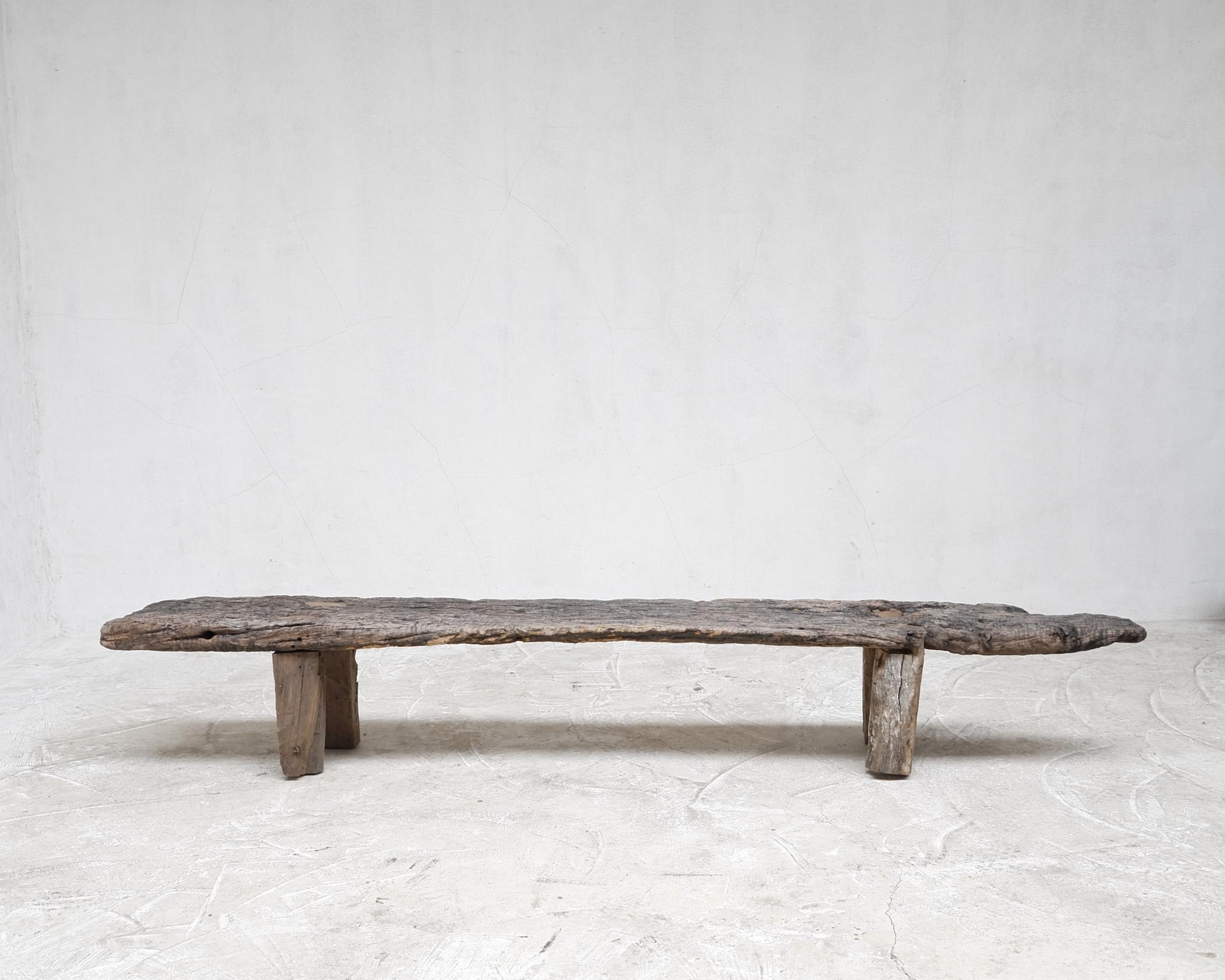 A large 19th C. Portuguese bench in the countries native cork wood.

Gnarled bleached out surface on four chunky walnut legs.

-

We offer free shipping to the USA/Canada through Fedex with this item.
