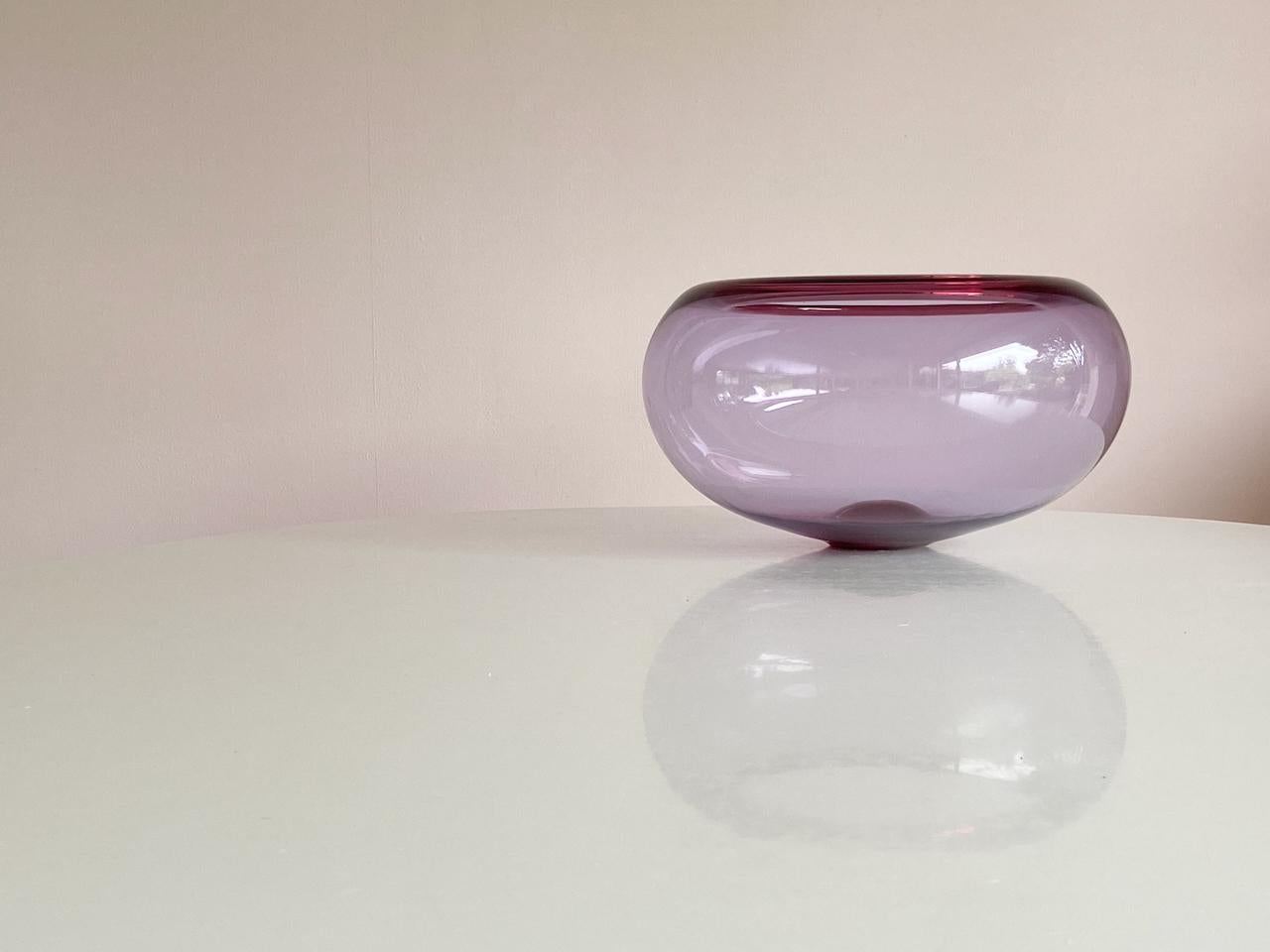 XL large hand-blown light purple glass bowl designed by Per Lütken and manufactured by Royal Copenhagen in Denmark. 
Price for the XL Bowl for the other Set of three, see other items from the seller.