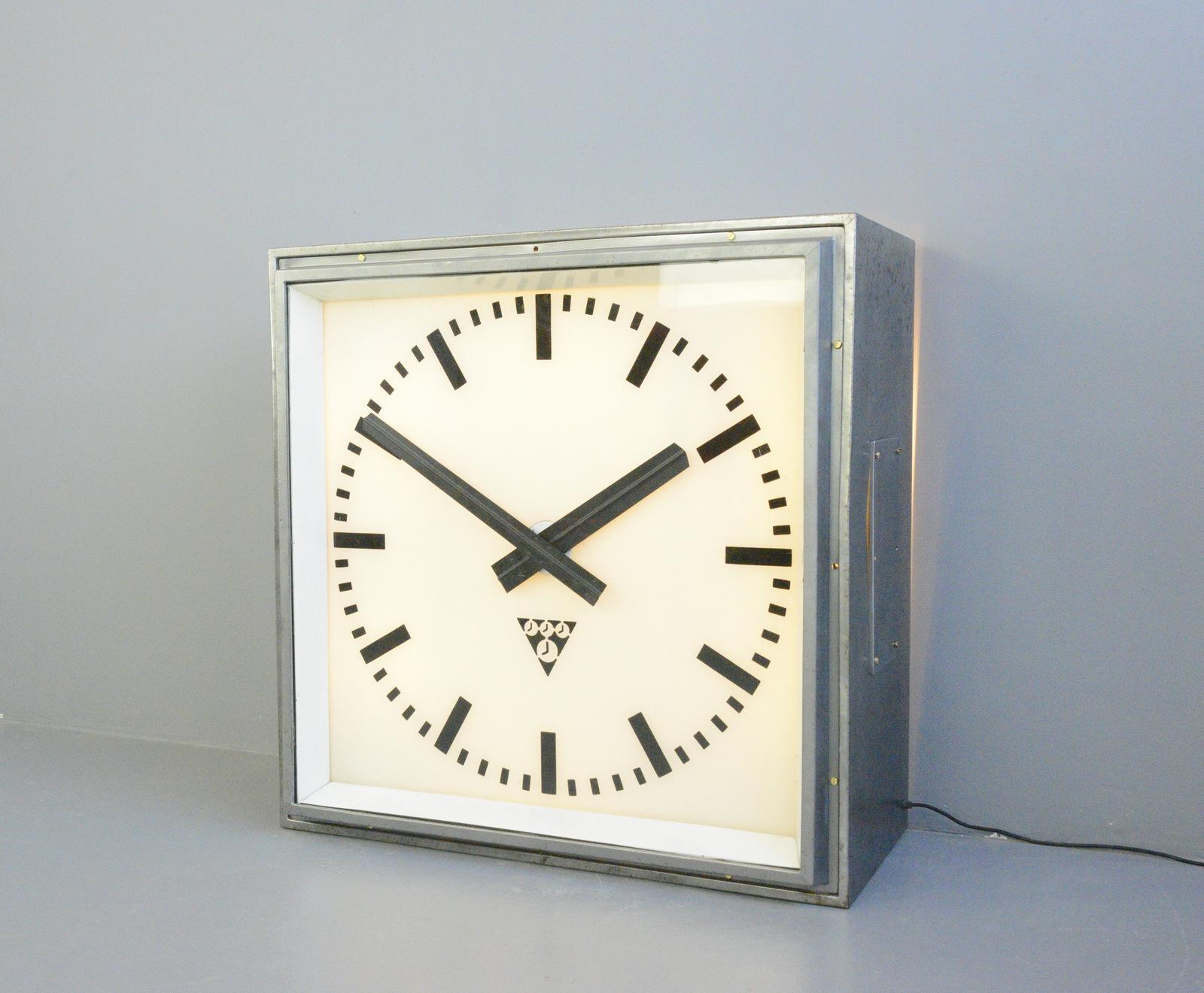 XL light up station clock by Pragotron circa 1950s

- Steel casing
- Glass face and dial
- Original hands
- Can be wall mounted or floor standing
- Takes 6x E27 fitting bulbs
- The lights are remote controlled
- Made by Pragotron
- Czech ~