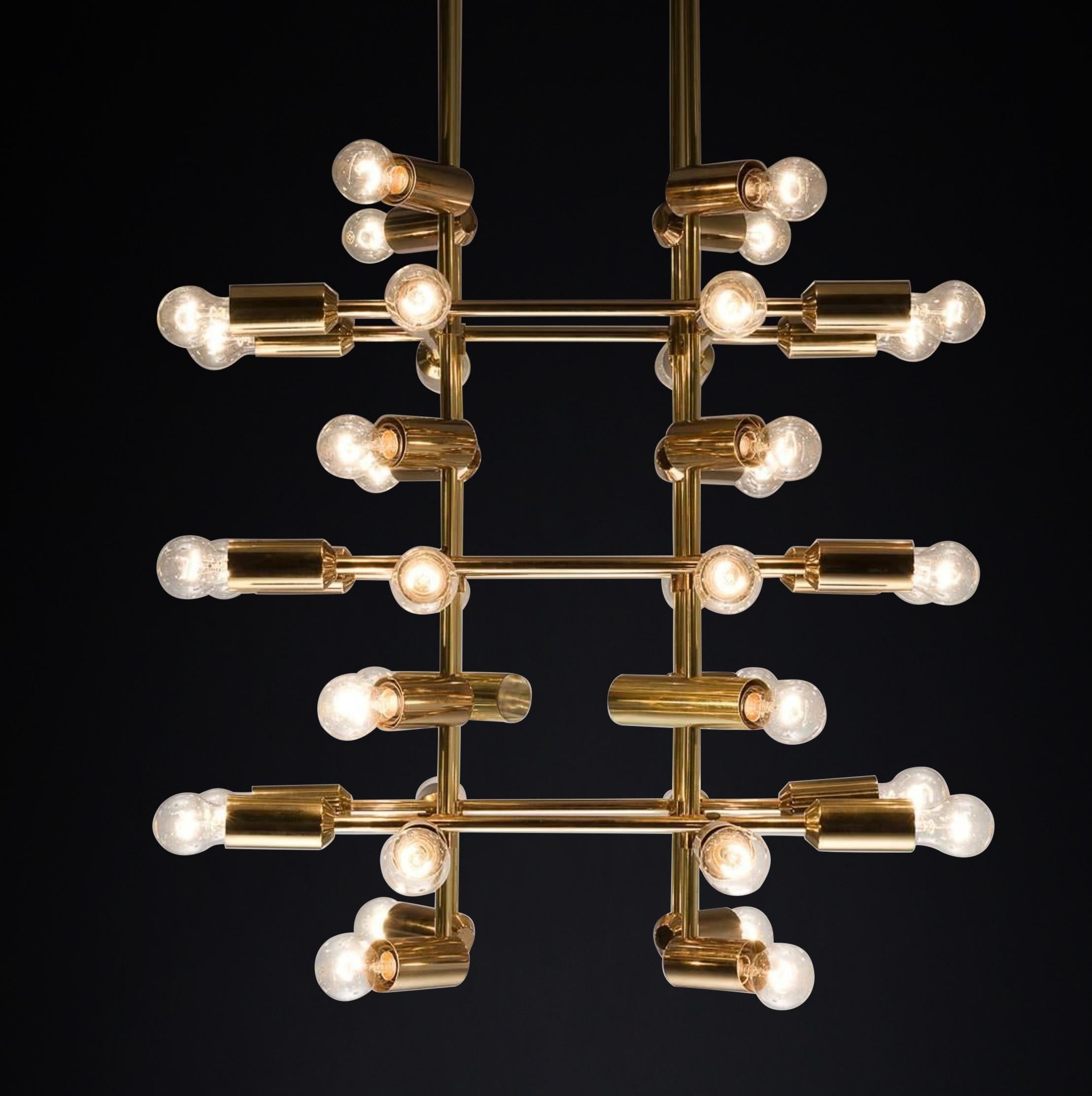 Swiss Xl Mid-Century Brass Chandelier with 40 lights, Switzerland 1960s.   For Sale