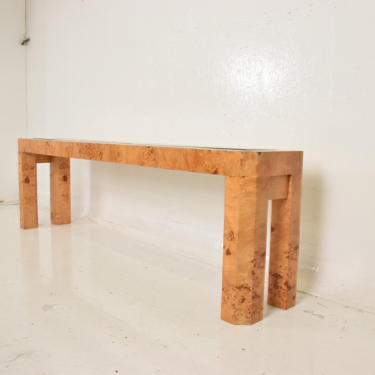 For your consideration, a Mid-Century Modern French custom ash burl wood console table.


Custom made. Unique, one of a kind. 


France, circa 1960s. No markings present from the maker. 


Dimensions: 15 3/4