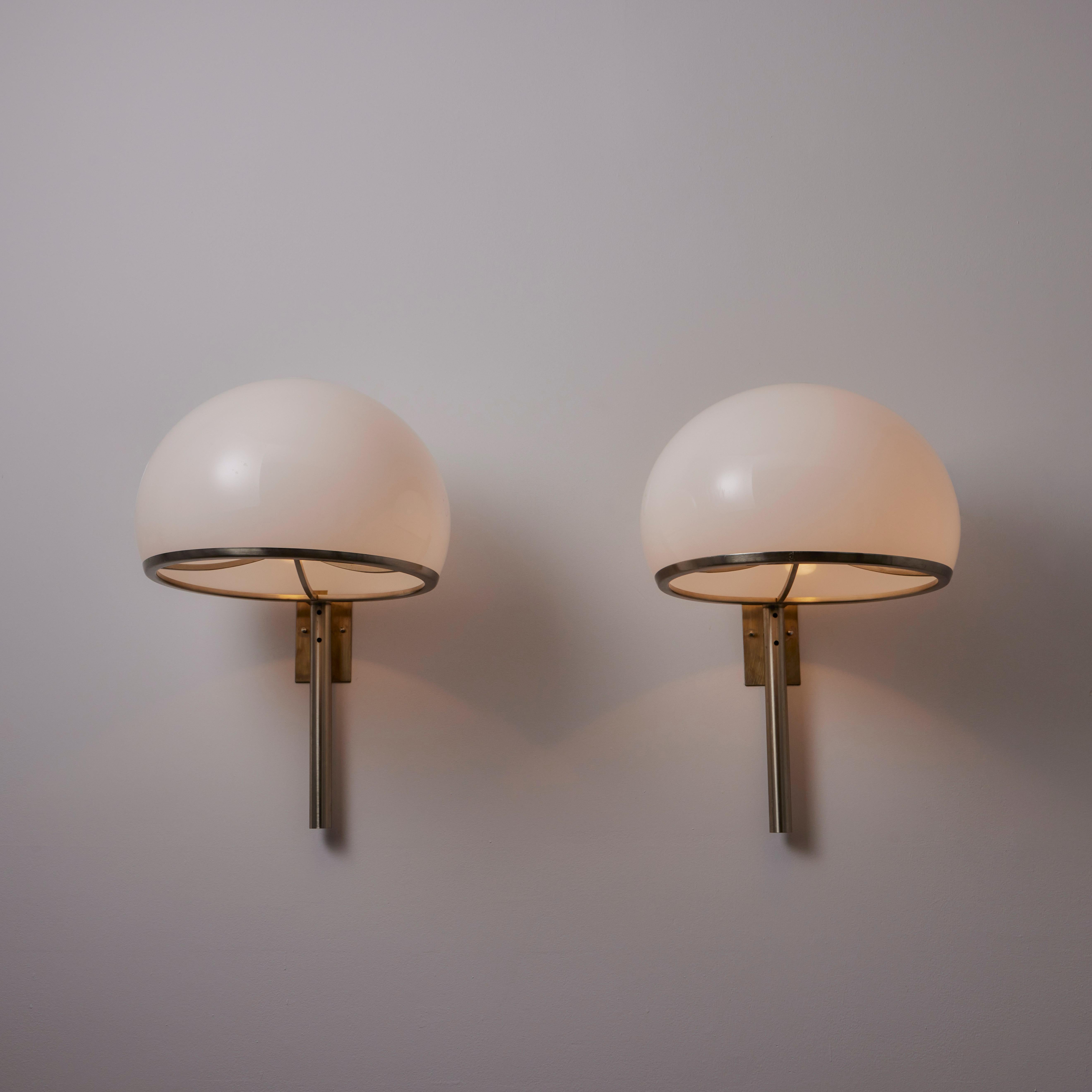 XL Mod. 252/p Sconces by Vittorio Gregotti, Lodovico Meneghetti, and Giotto Stoppino for Arteluce. Designed and manufactured in Italy, in 1966. Large wall lamps comprising of silver patinated brass mounting bodies and acrylic dome diffusers. The
