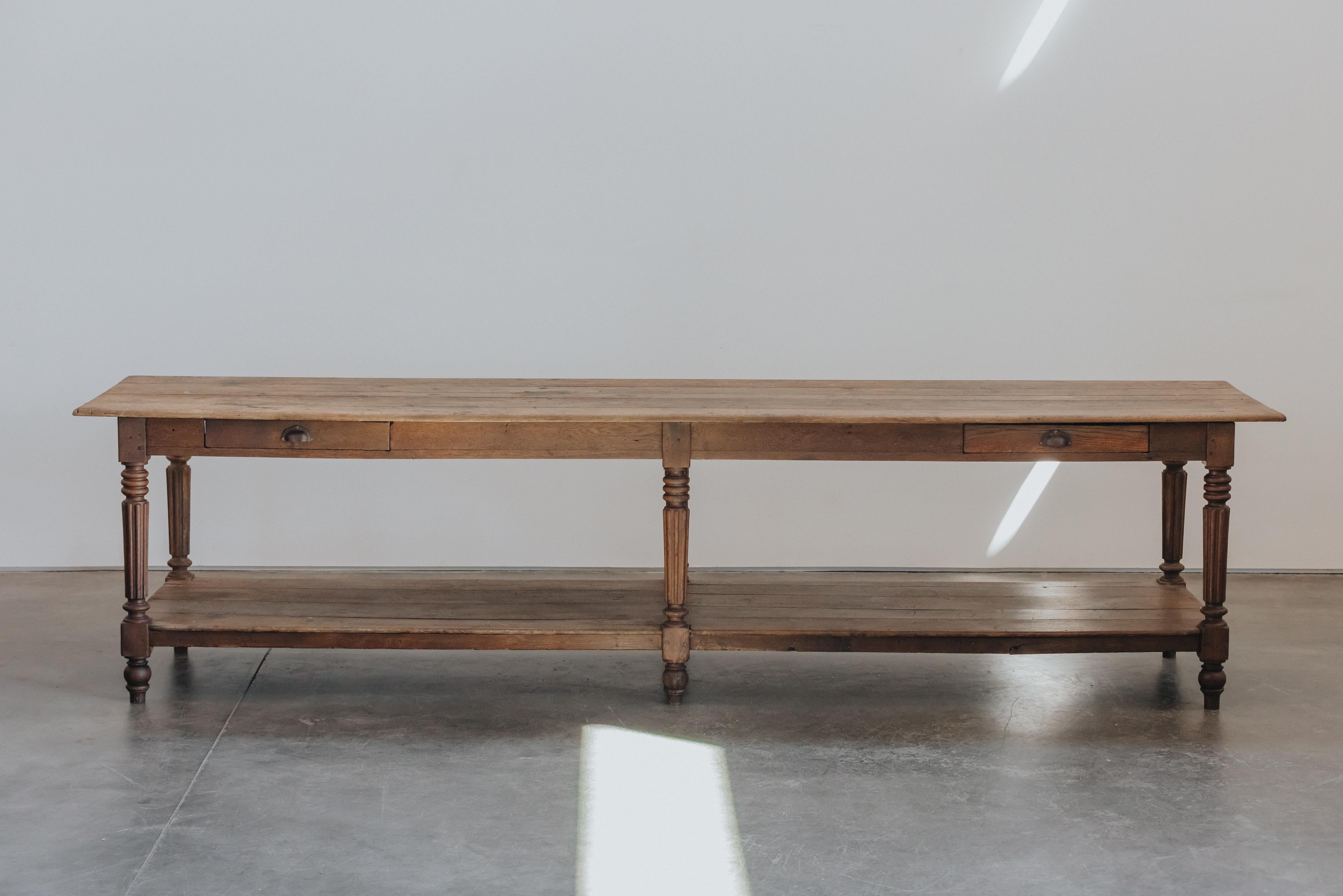 XL Oak Draper Table From France, Circa 1880.  Solid oak construction with original hardware.  Very sturdy model with excellent patina and wear.