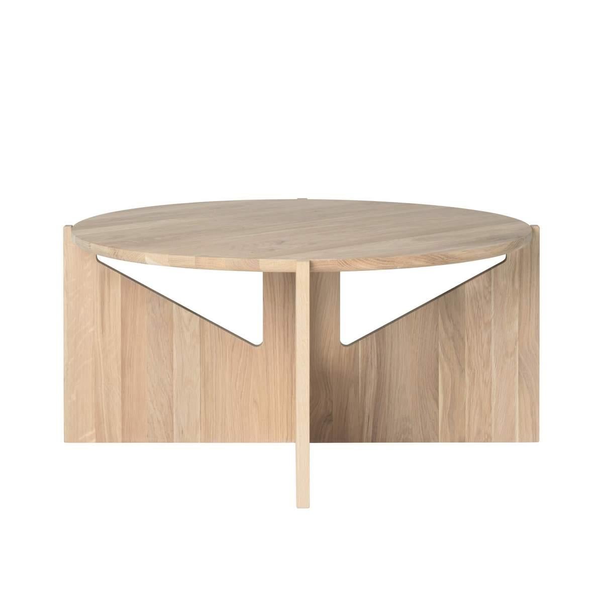 Oak table by Kristina Dam Studio.
Materials: Solid oak with oil treatment. 
Also available in other colors and sizes.
Dimensions: 78 x 78 x H 36cm.

XL Oak Table is a huge coffee table based on the exact same design as the Stool and Table. This