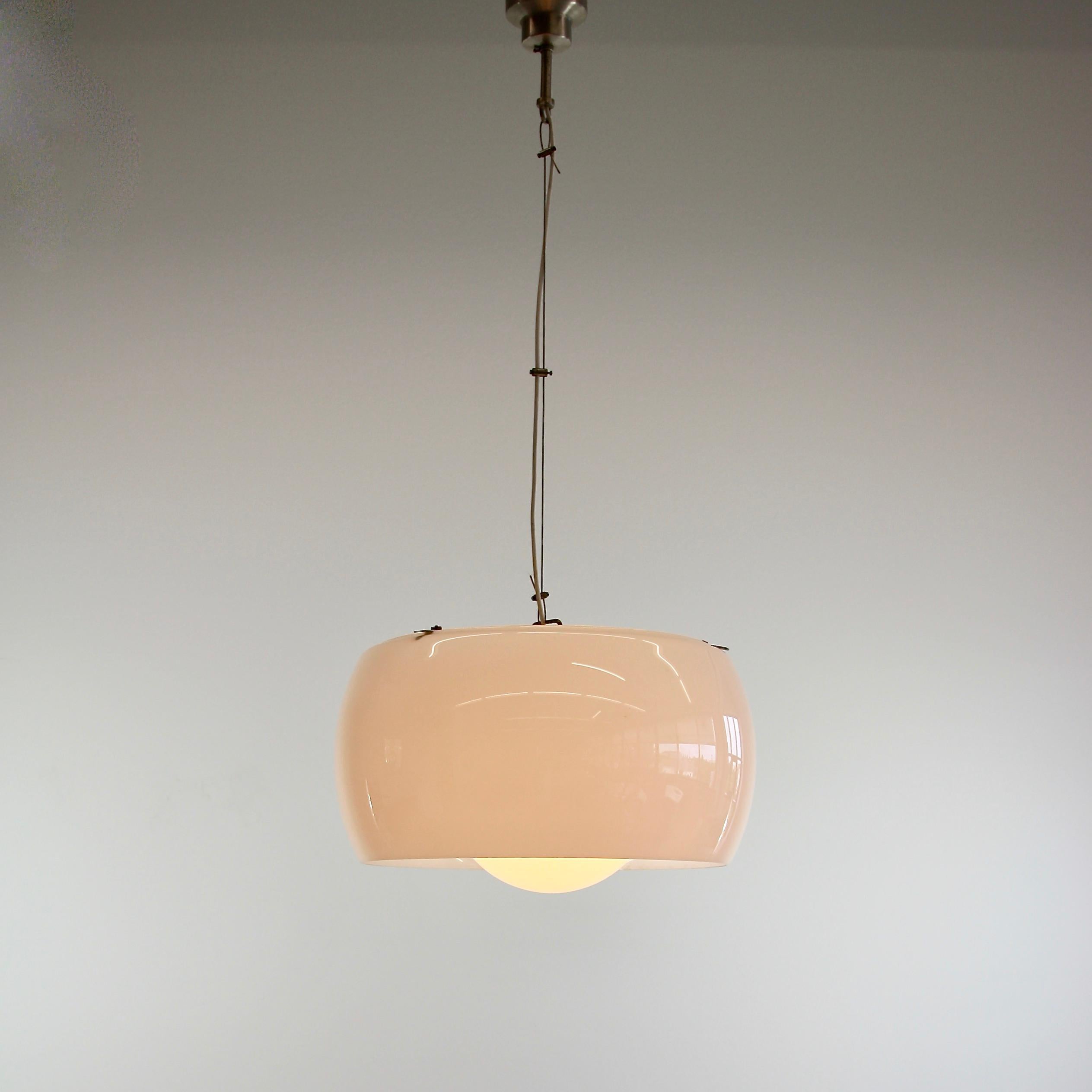 Hanging lamp designed by Vico Magistretti. Italy, Artemide, 1962.

The XL size Omega lamp comprising of two separate pieces of opaline glass on a brushed metal frame. The lamp height can be adjusted as needed.

We also have the normal size